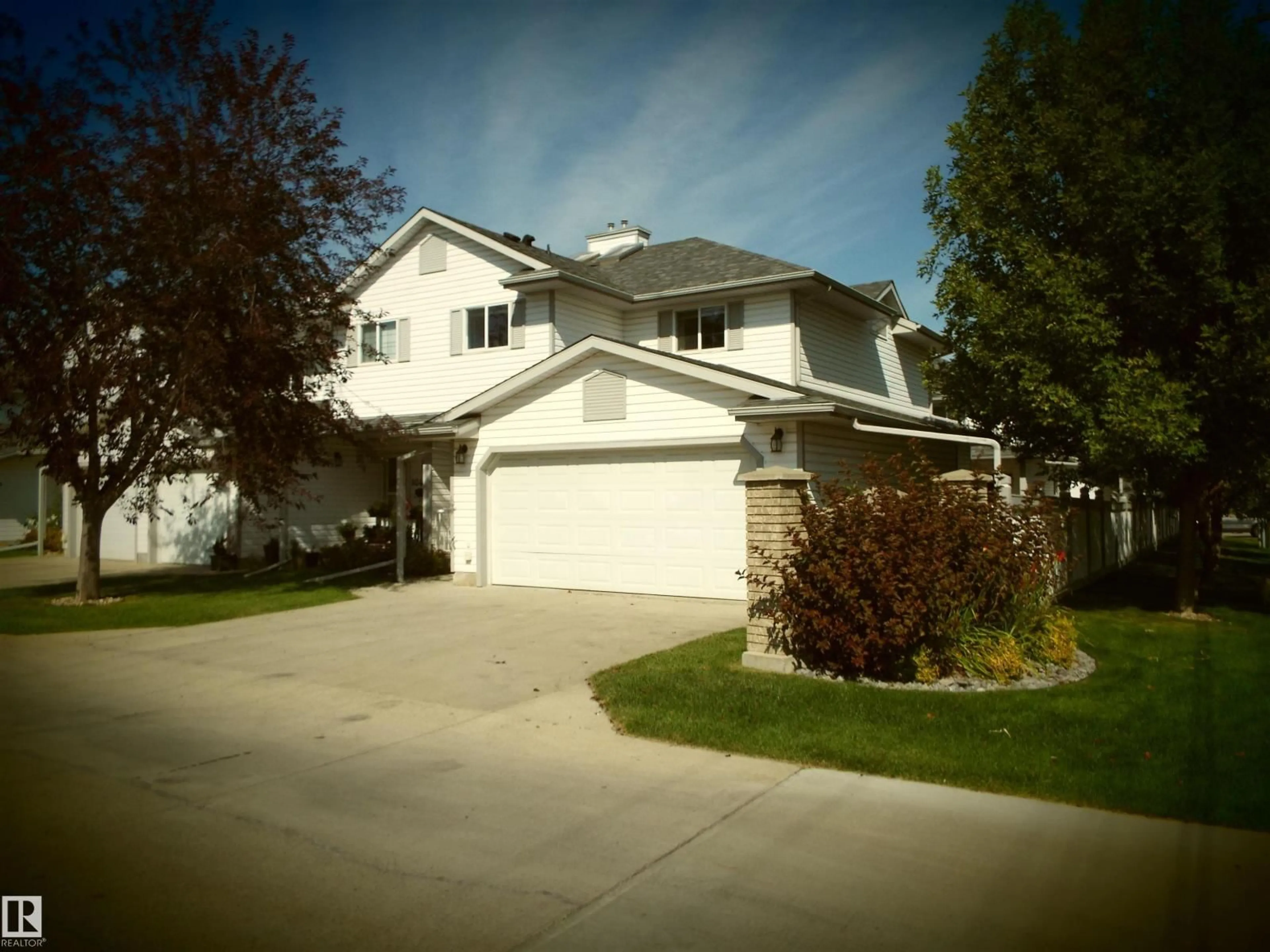 Home with vinyl exterior material, street for 102 4302 48 ST, Leduc Alberta T9E8J6