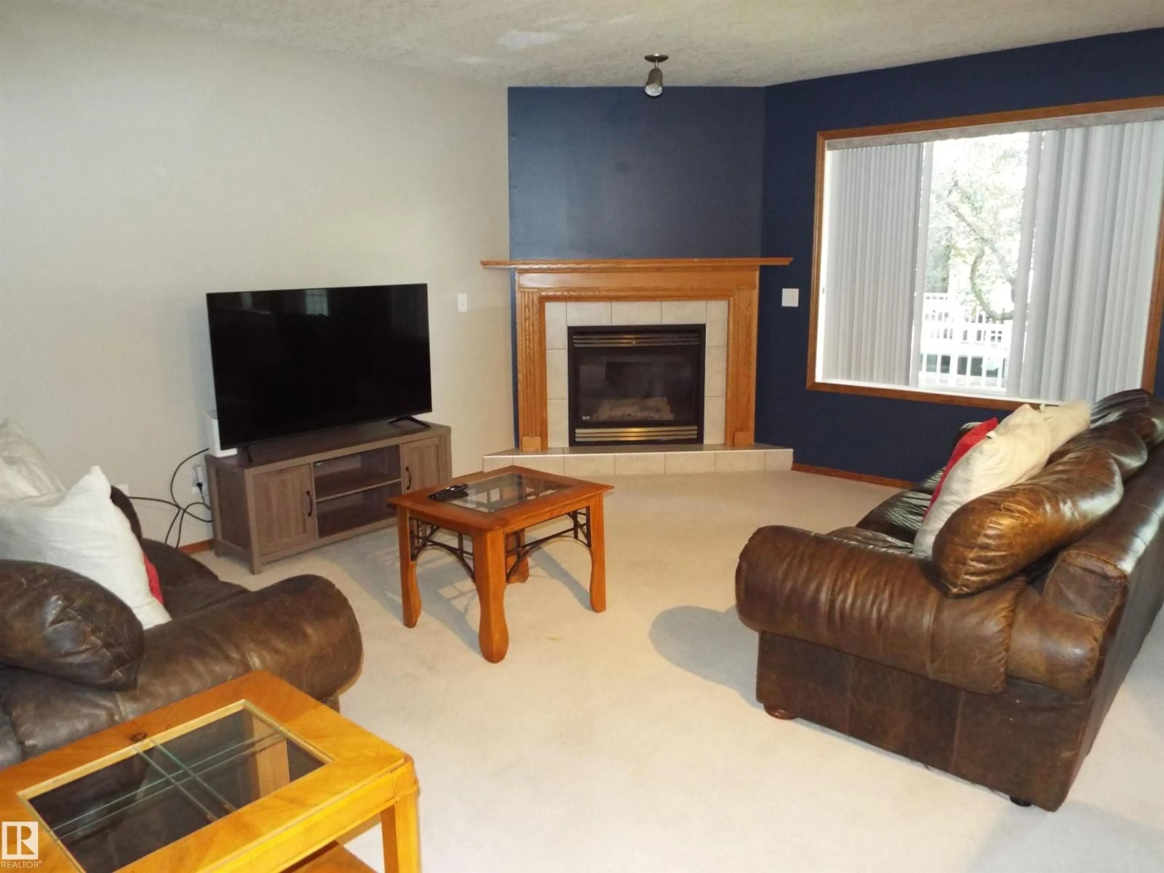 Living room with furniture, unknown for 102 4302 48 ST, Leduc Alberta T9E8J6