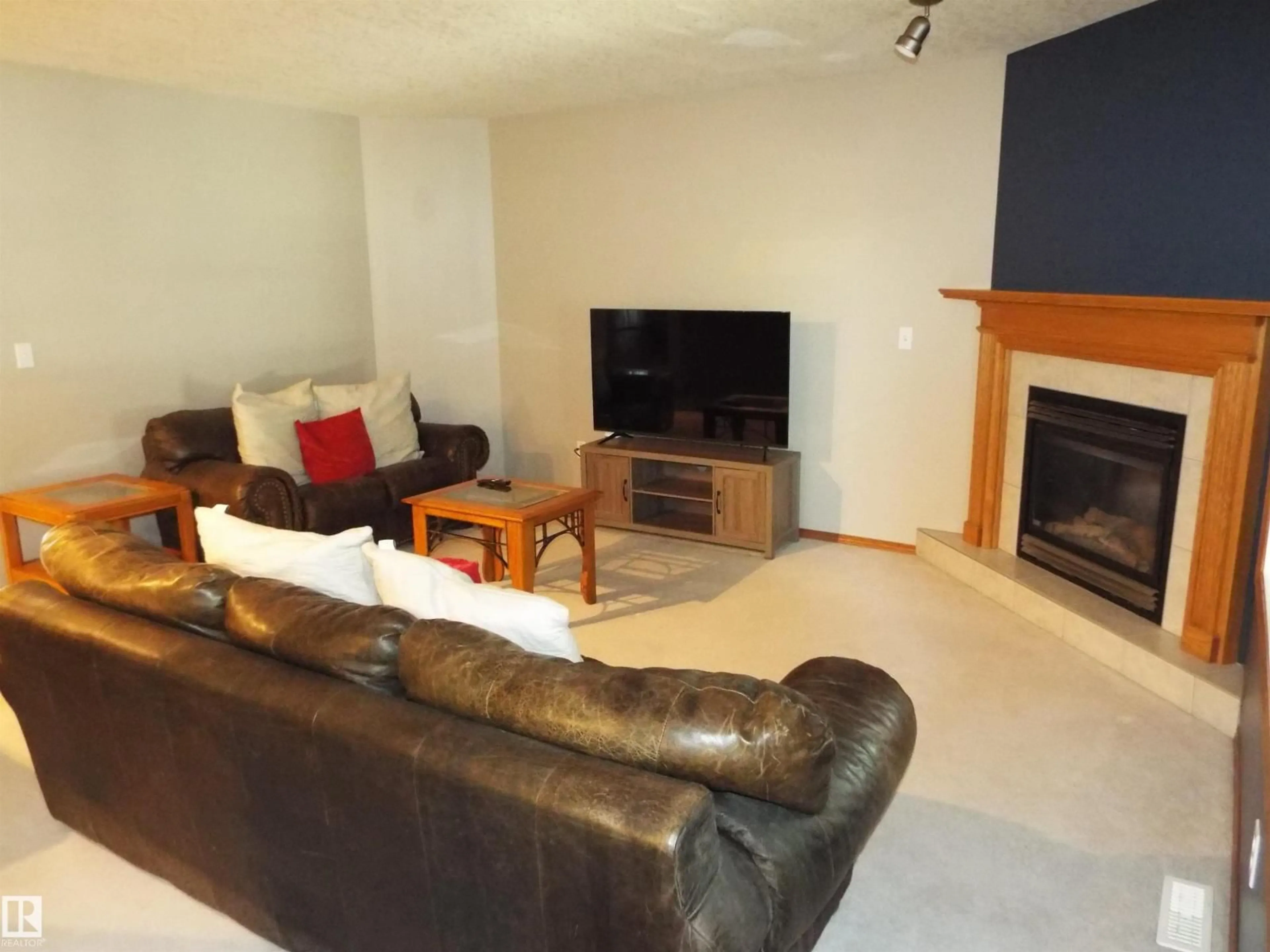 Living room with furniture, unknown for 102 4302 48 ST, Leduc Alberta T9E8J6