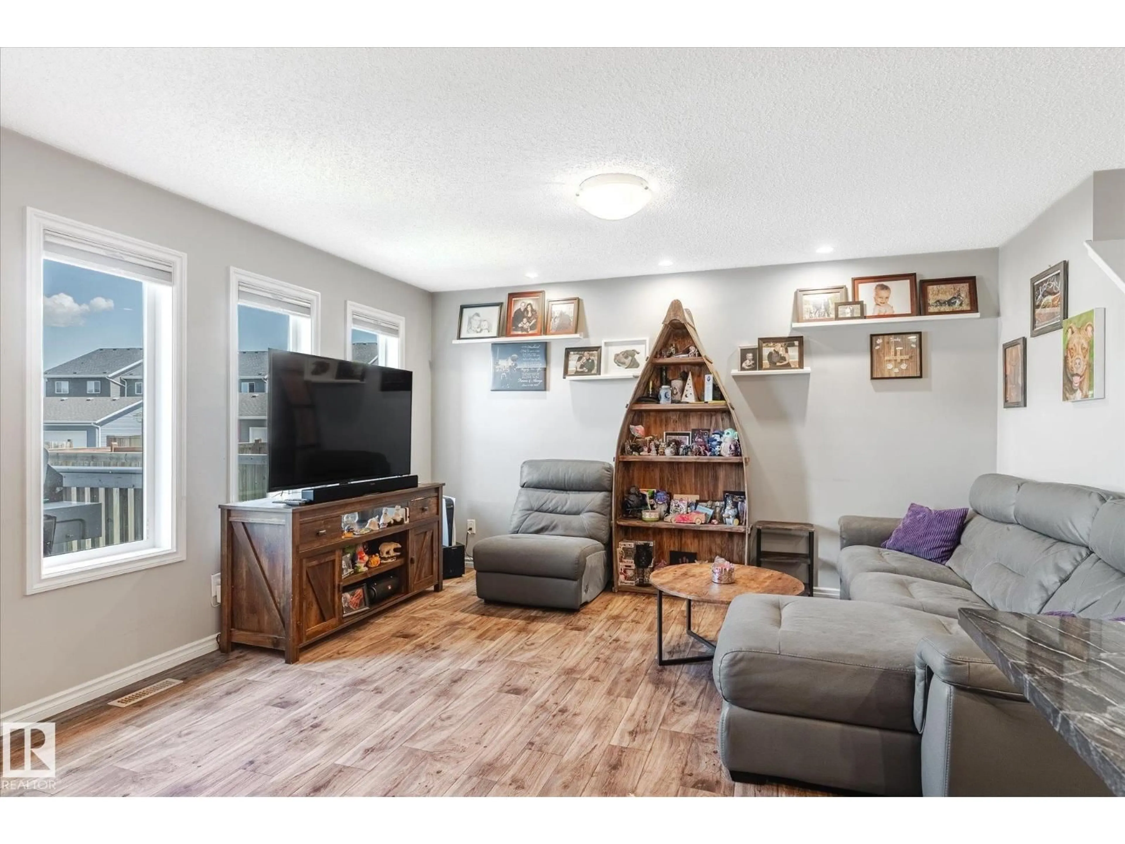 Living room with furniture, unknown for 2424 19A AV, Edmonton Alberta T6T2C9