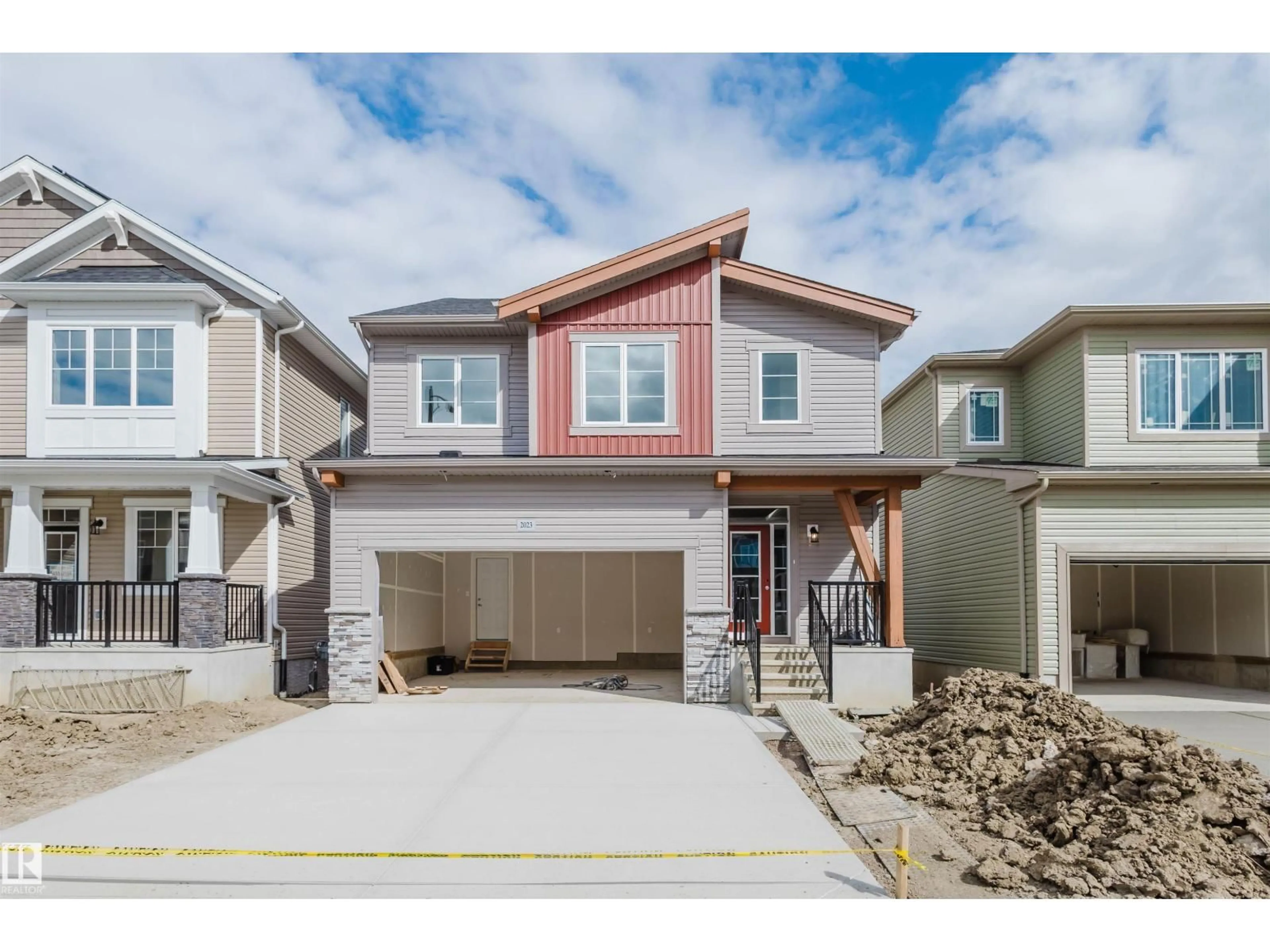 Home with vinyl exterior material, street for NW - 2023 209 ST, Edmonton Alberta T6M2P5
