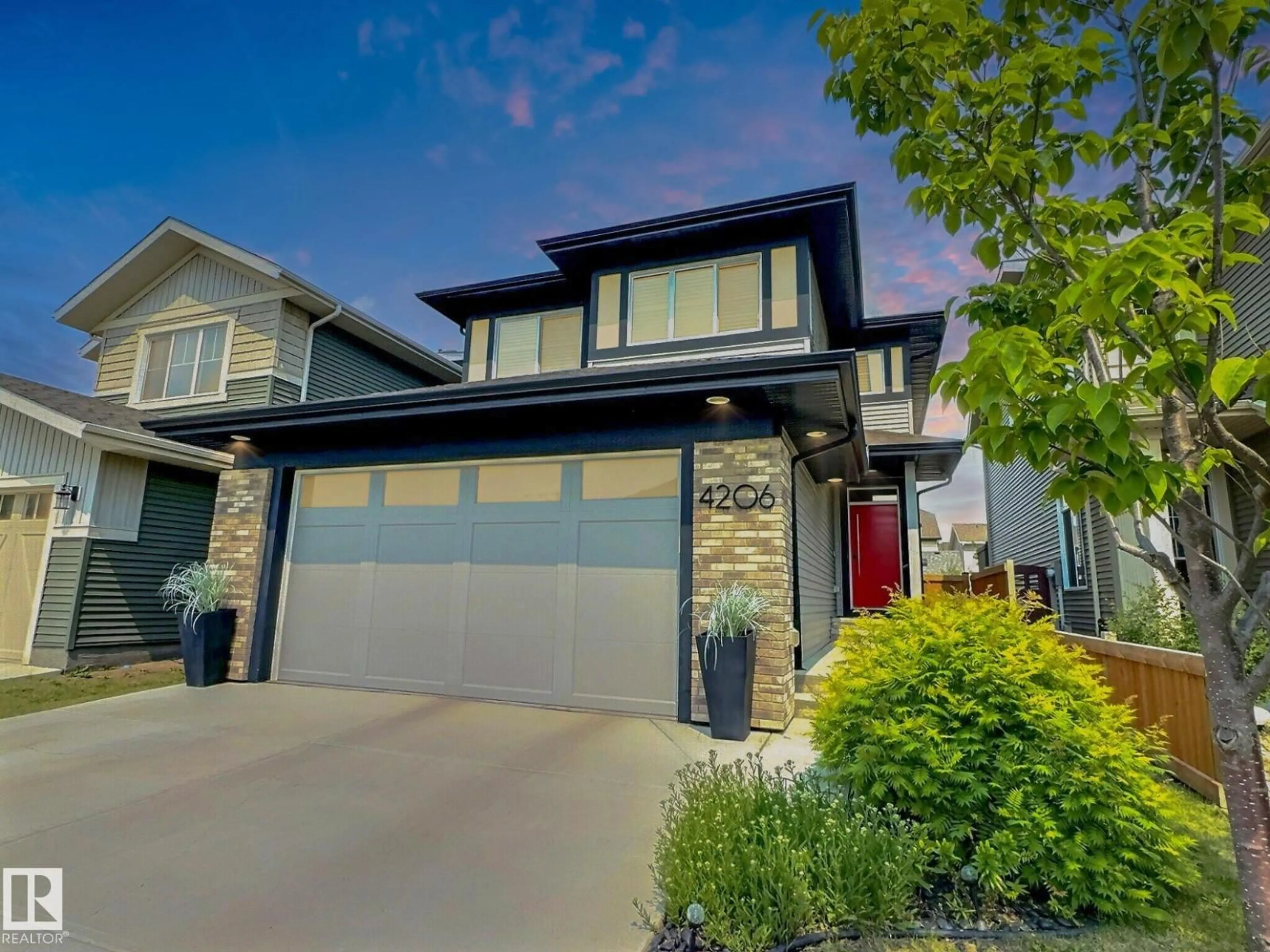 Home with vinyl exterior material, street for 4206 CHICHAK CL, Edmonton Alberta T6W4B3