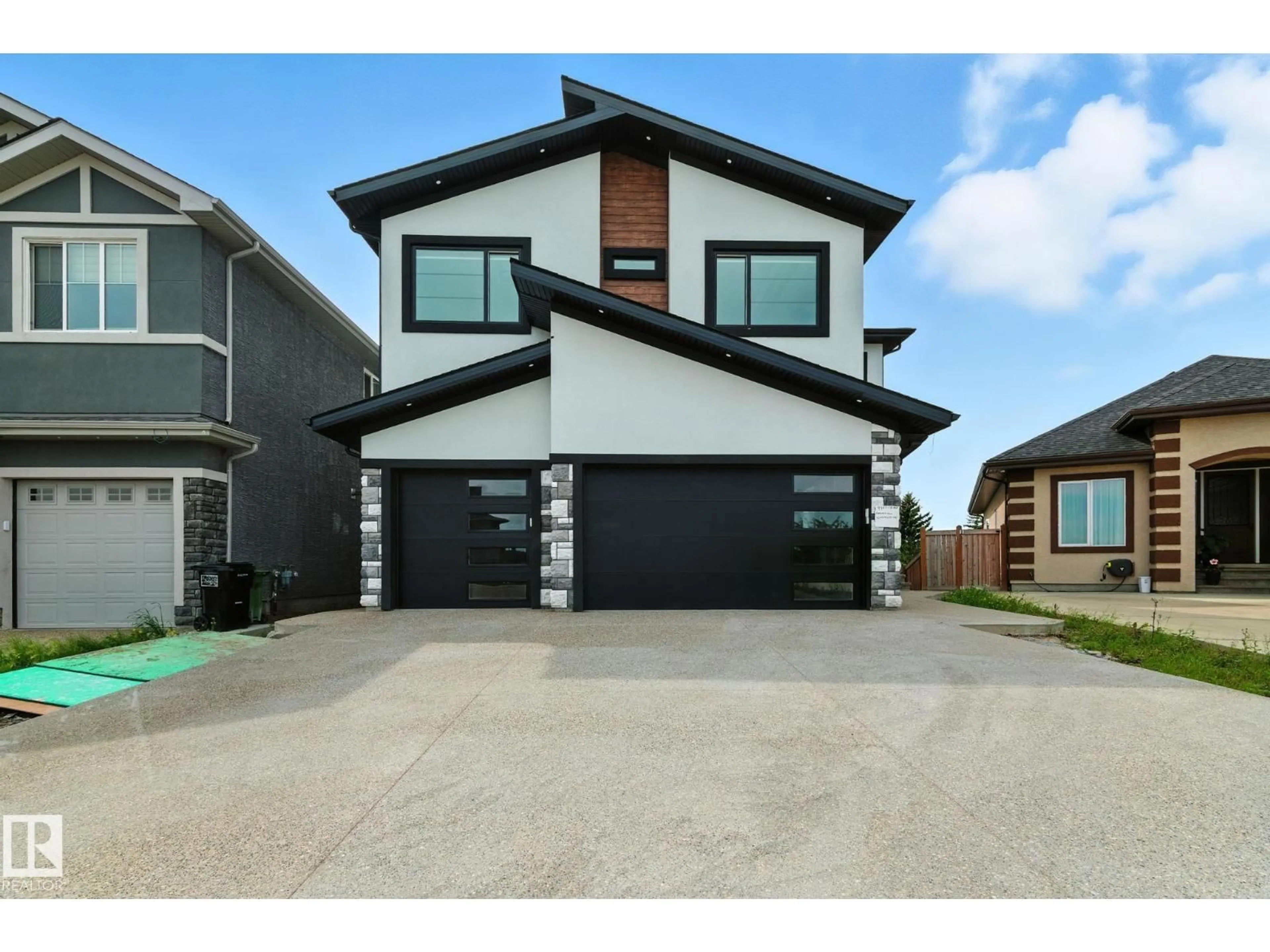 Home with brick exterior material, street for NW - 9423 181 AV, Edmonton Alberta T5Z0K2