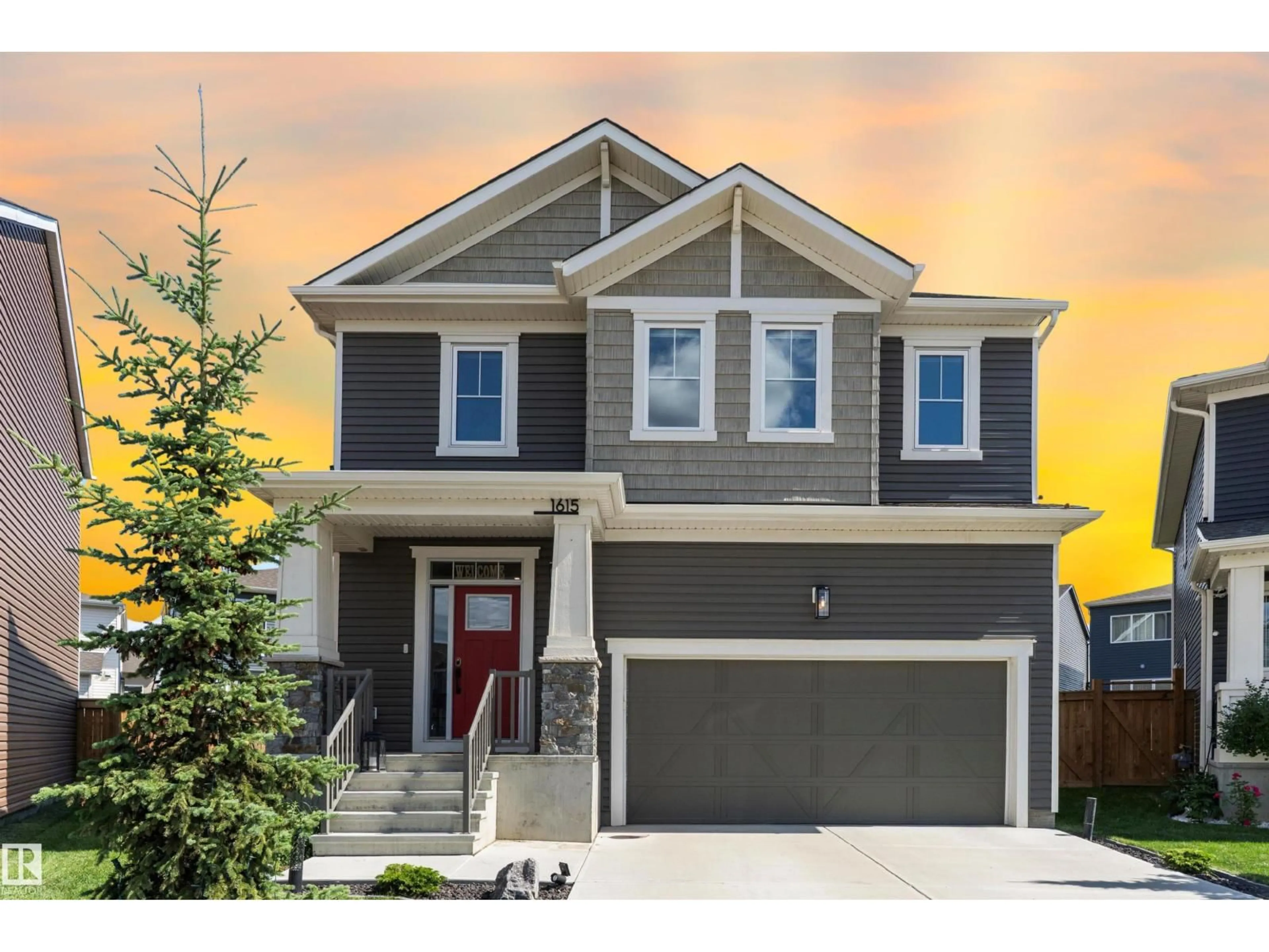 Home with vinyl exterior material, street for NW - 1615 202 ST, Edmonton Alberta T6M1K6
