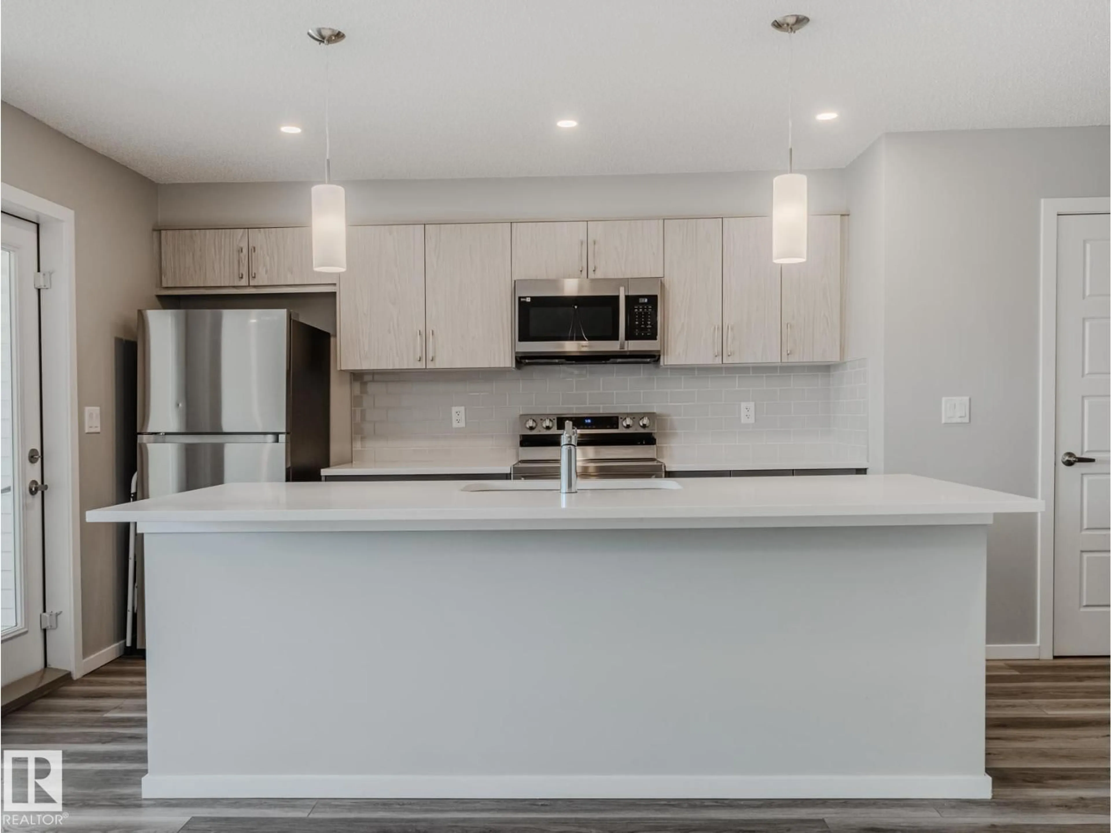 Open concept kitchen, unknown for NW - 20532 21 AV, Edmonton Alberta T6M1N2