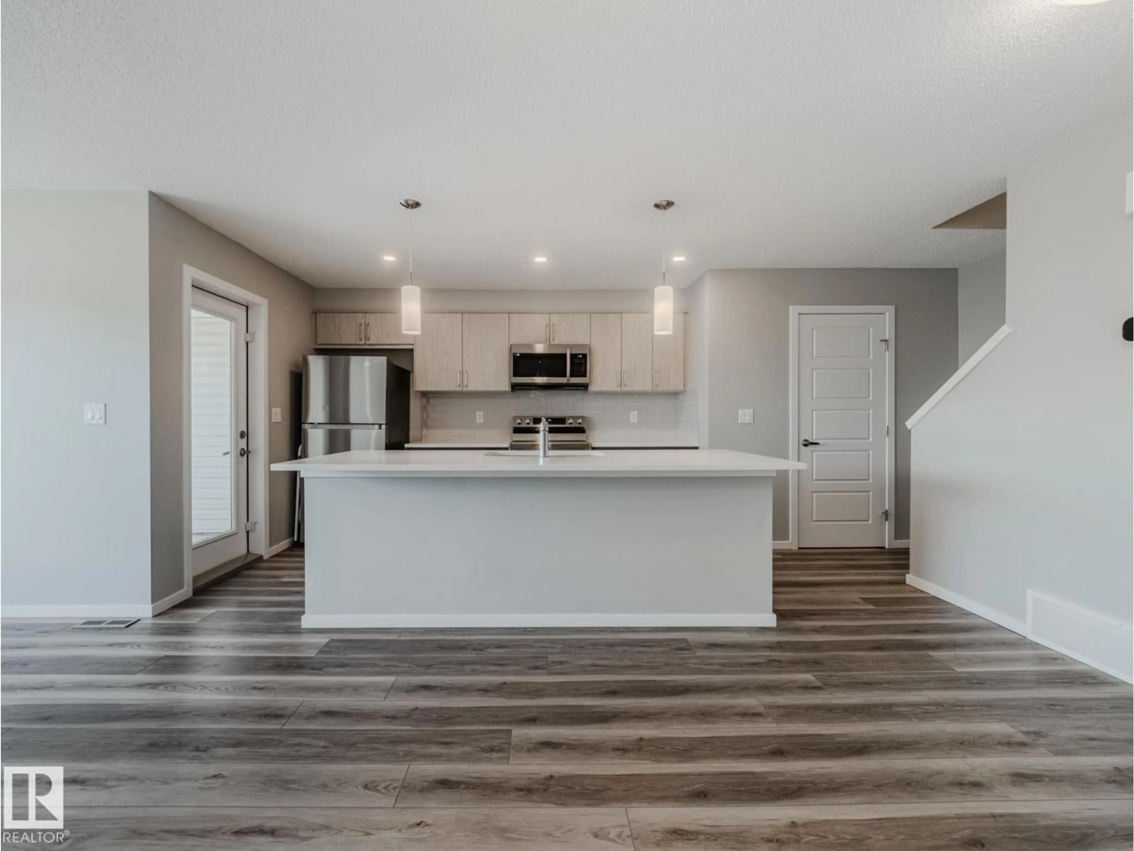 Open concept kitchen, unknown for NW - 20532 21 AV, Edmonton Alberta T6M1N2