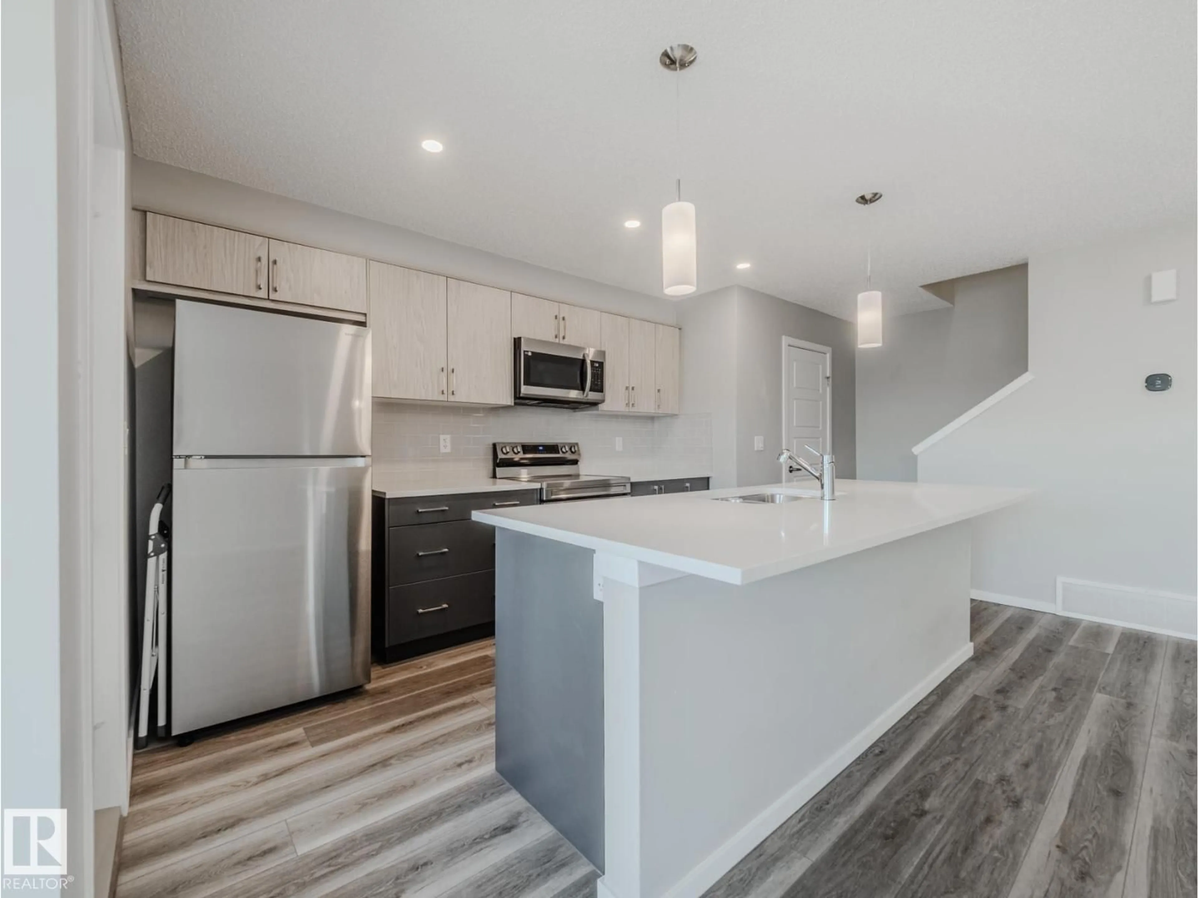 Open concept kitchen, unknown for NW - 20532 21 AV, Edmonton Alberta T6M1N2