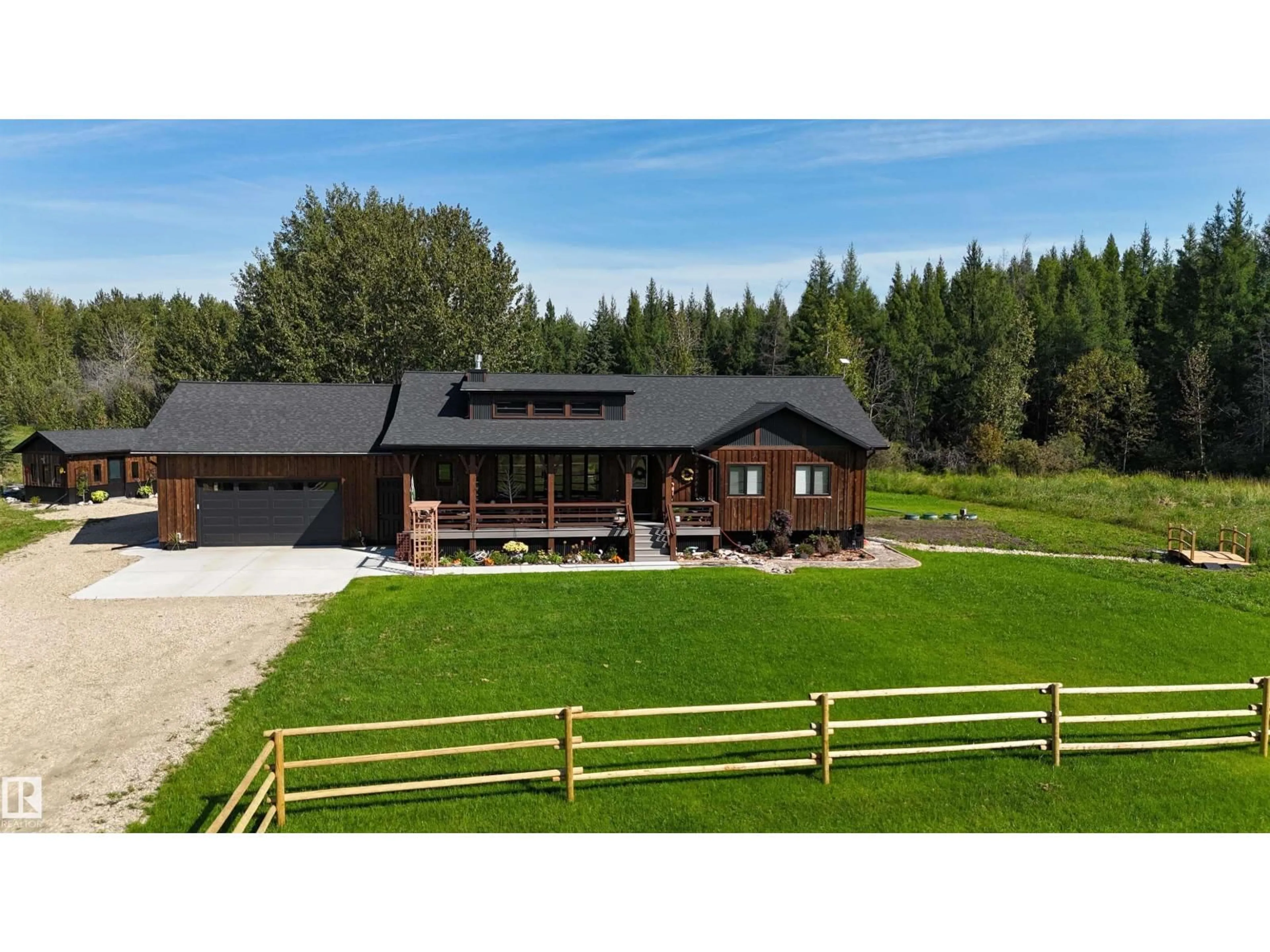 A pic from outside/outdoor area/front of a property/back of a property/a pic from drone, unknown for 7304A HWY 624, Rural Parkland County Alberta T7A1R9