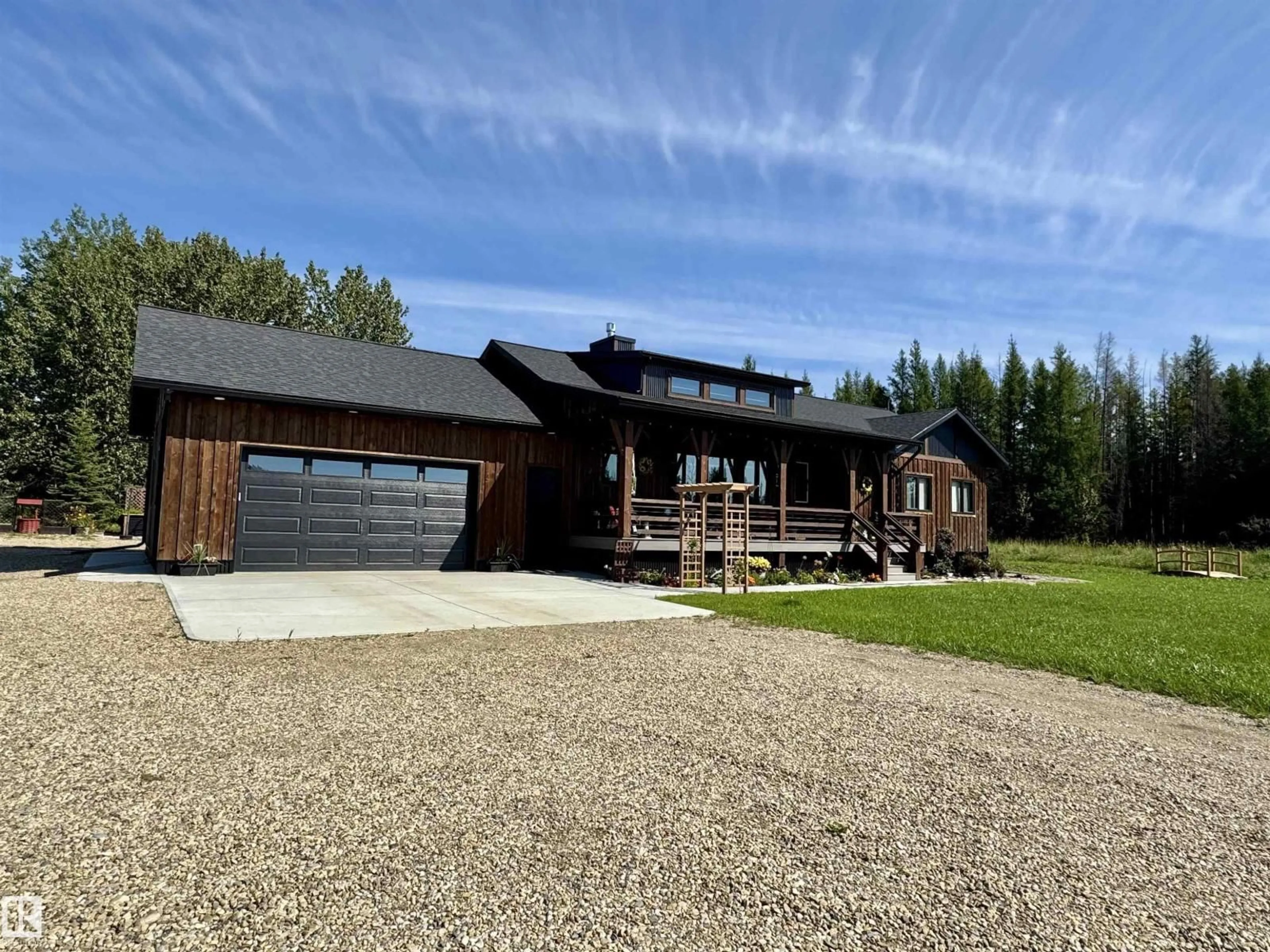 A pic from outside/outdoor area/front of a property/back of a property/a pic from drone, unknown for 7304A HWY 624, Rural Parkland County Alberta T7A1R9