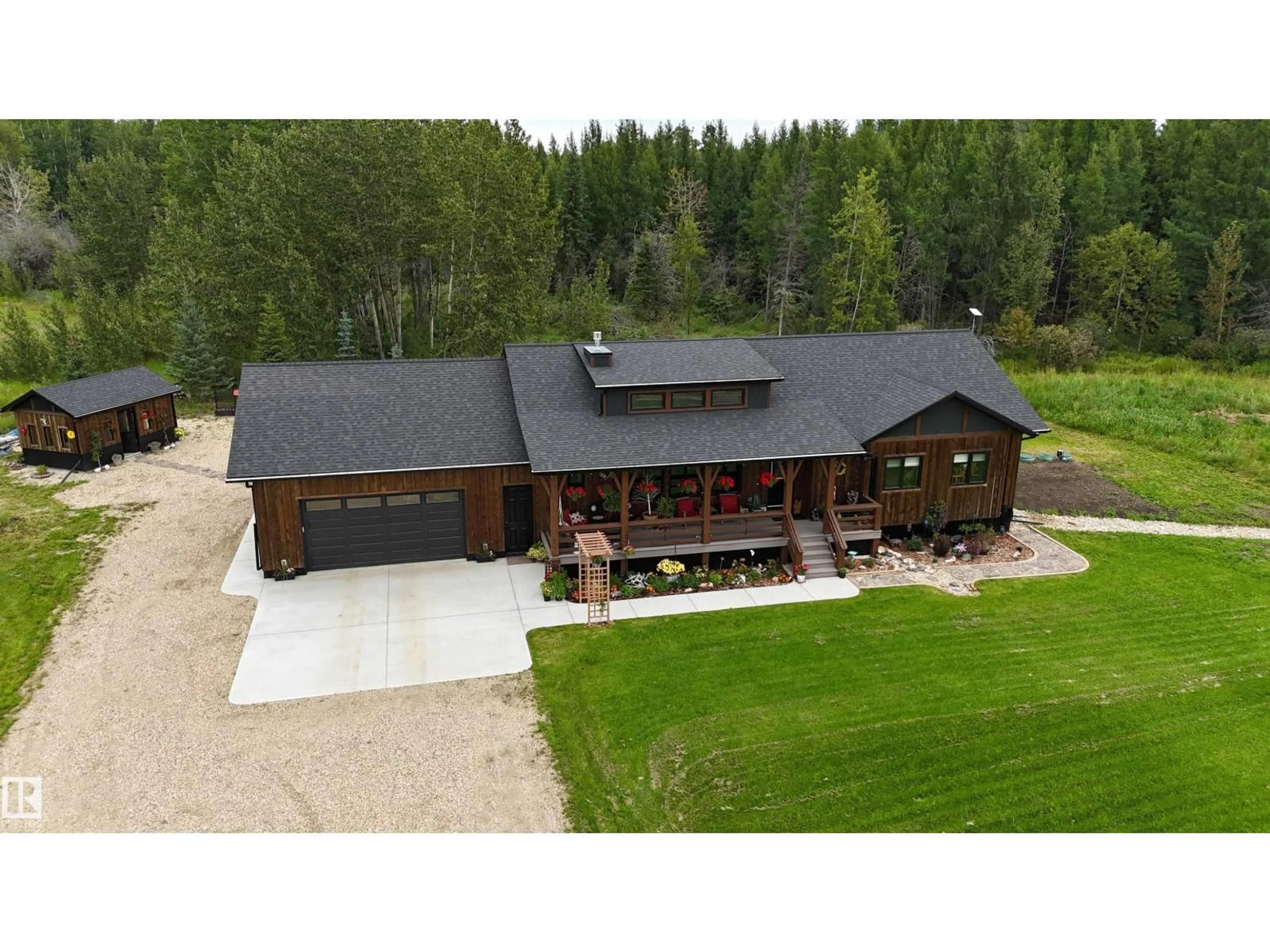A pic from outside/outdoor area/front of a property/back of a property/a pic from drone, building for 7304A HWY 624, Rural Parkland County Alberta T7A1R9