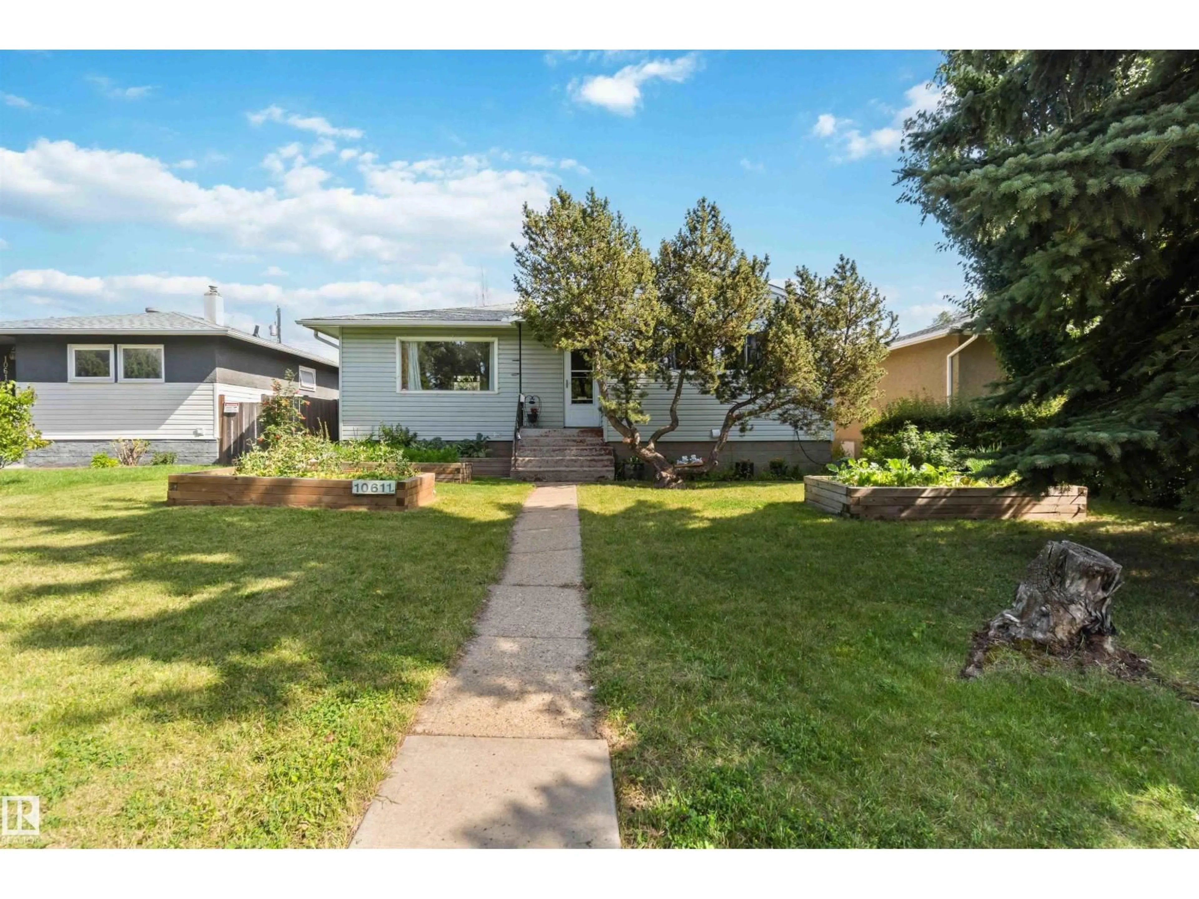 Home with vinyl exterior material, street for NW - 10611 149 ST, Edmonton Alberta T5P1L9