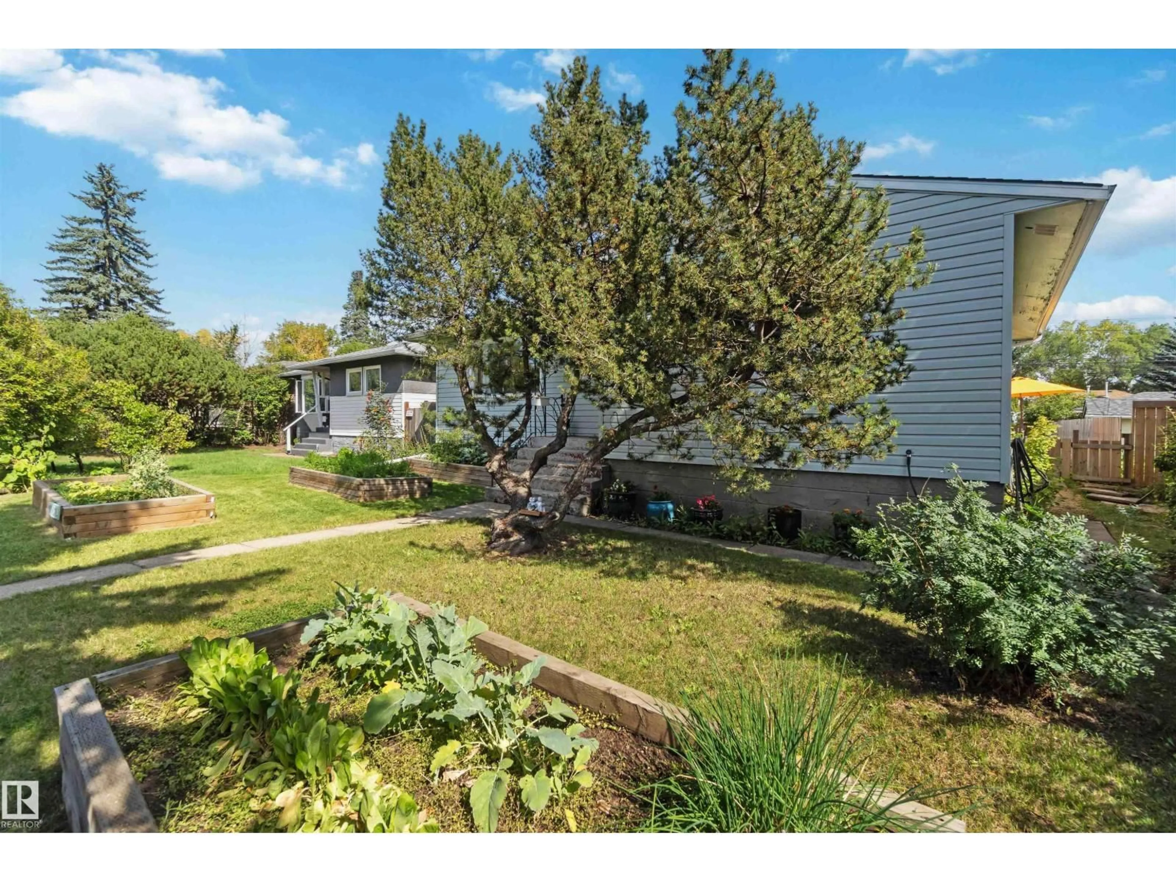 A pic from outside/outdoor area/front of a property/back of a property/a pic from drone, unknown for NW - 10611 149 ST, Edmonton Alberta T5P1L9