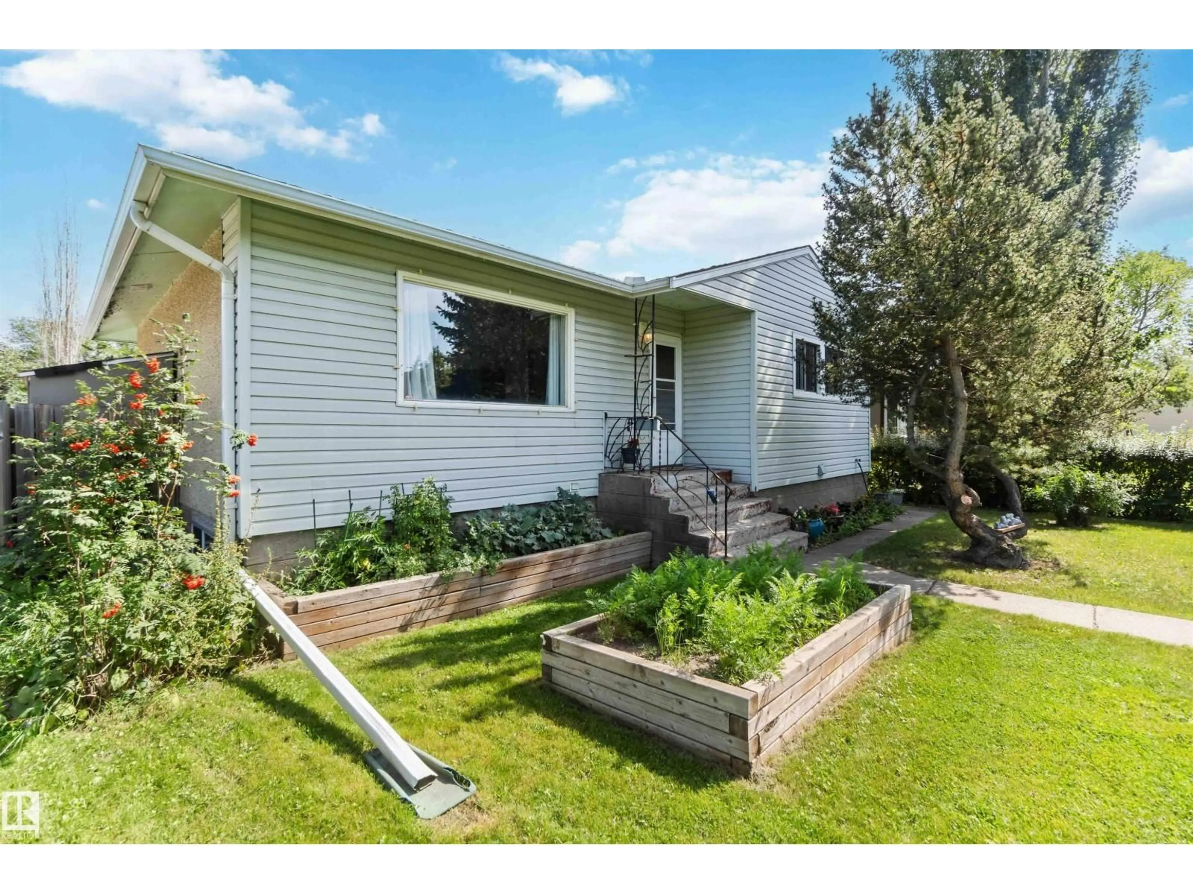 Home with vinyl exterior material, street for NW - 10611 149 ST, Edmonton Alberta T5P1L9