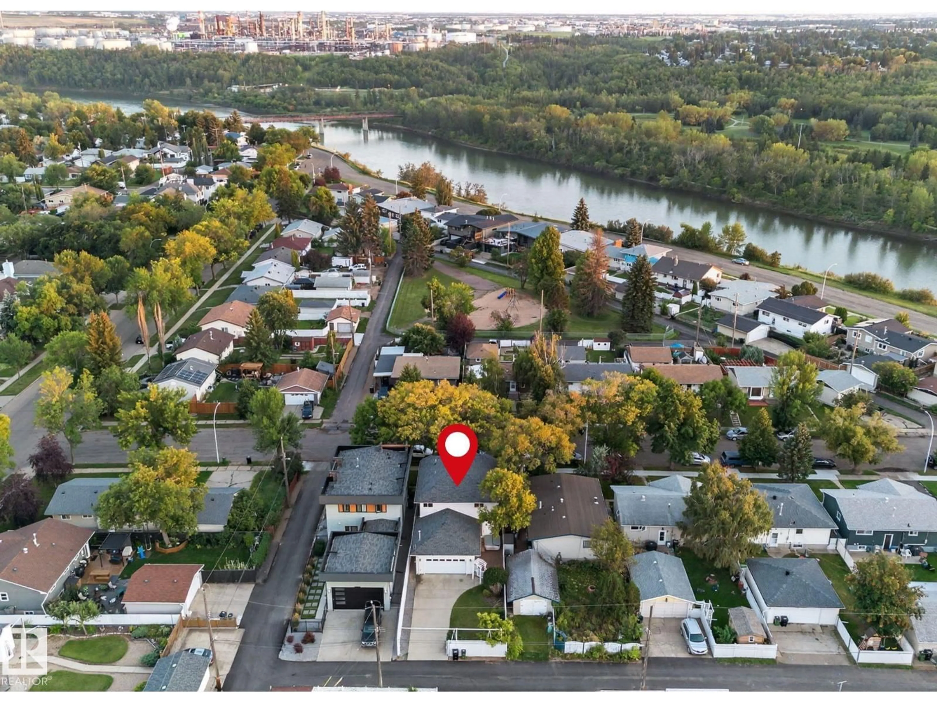A pic from outside/outdoor area/front of a property/back of a property/a pic from drone, water/lake/river/ocean view for 3814 108 AV, Edmonton Alberta T5W0G1