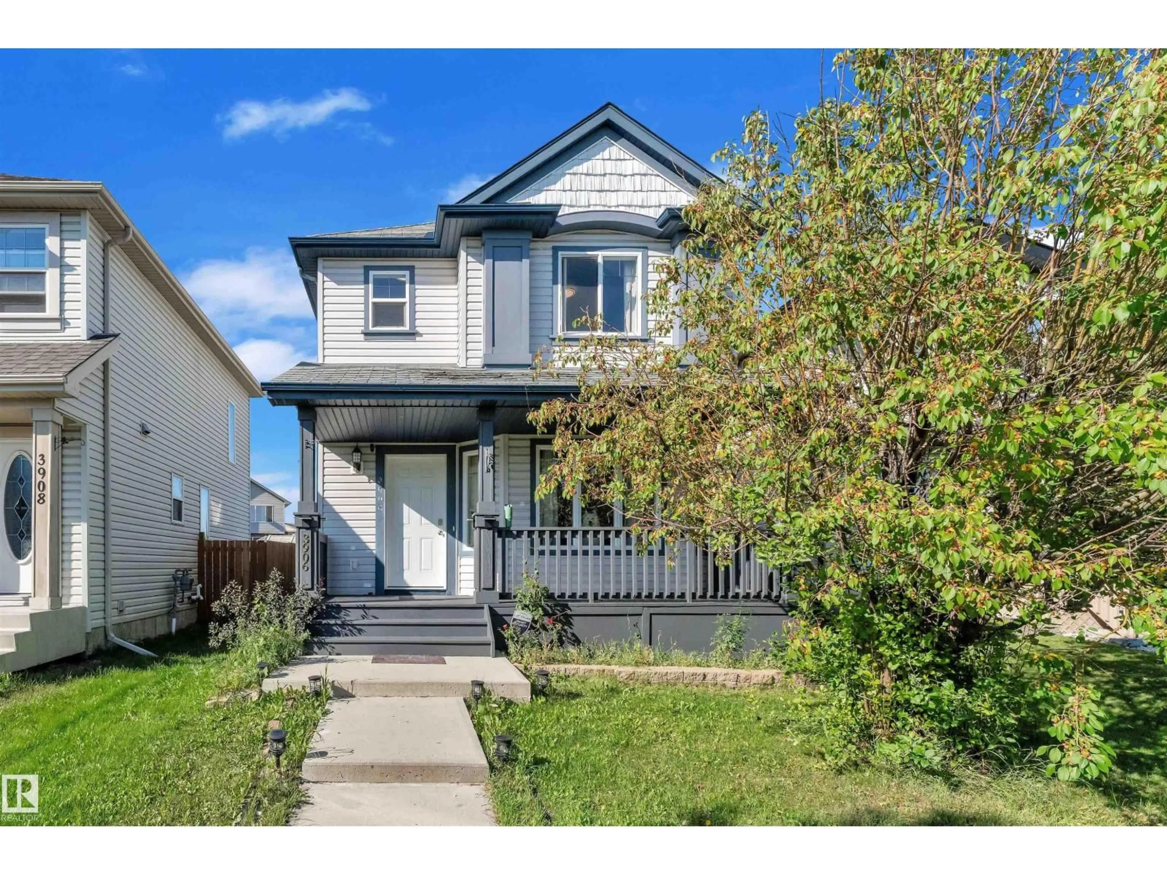 Home with vinyl exterior material, street for 3906 161 AV, Edmonton Alberta T5Y3J8