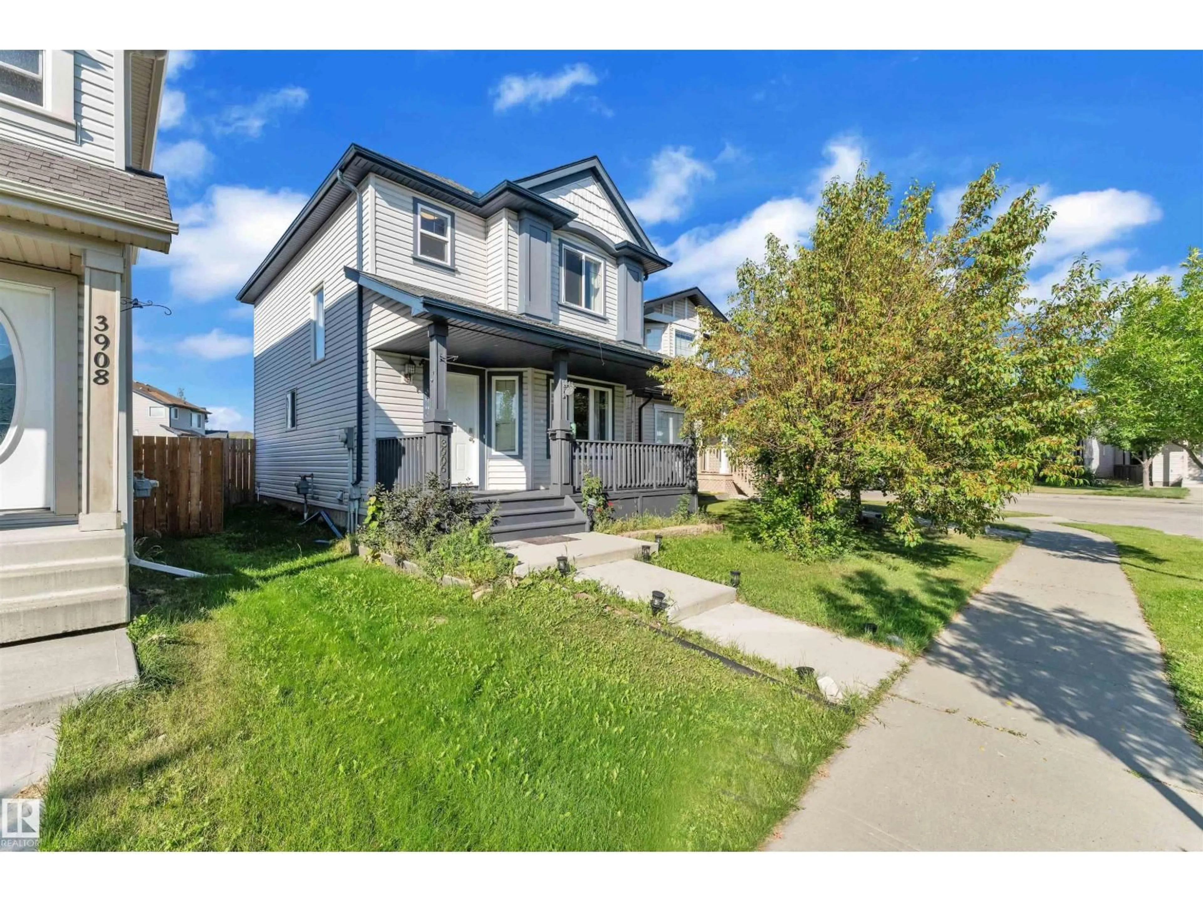 A pic from outside/outdoor area/front of a property/back of a property/a pic from drone, street for 3906 161 AV, Edmonton Alberta T5Y3J8