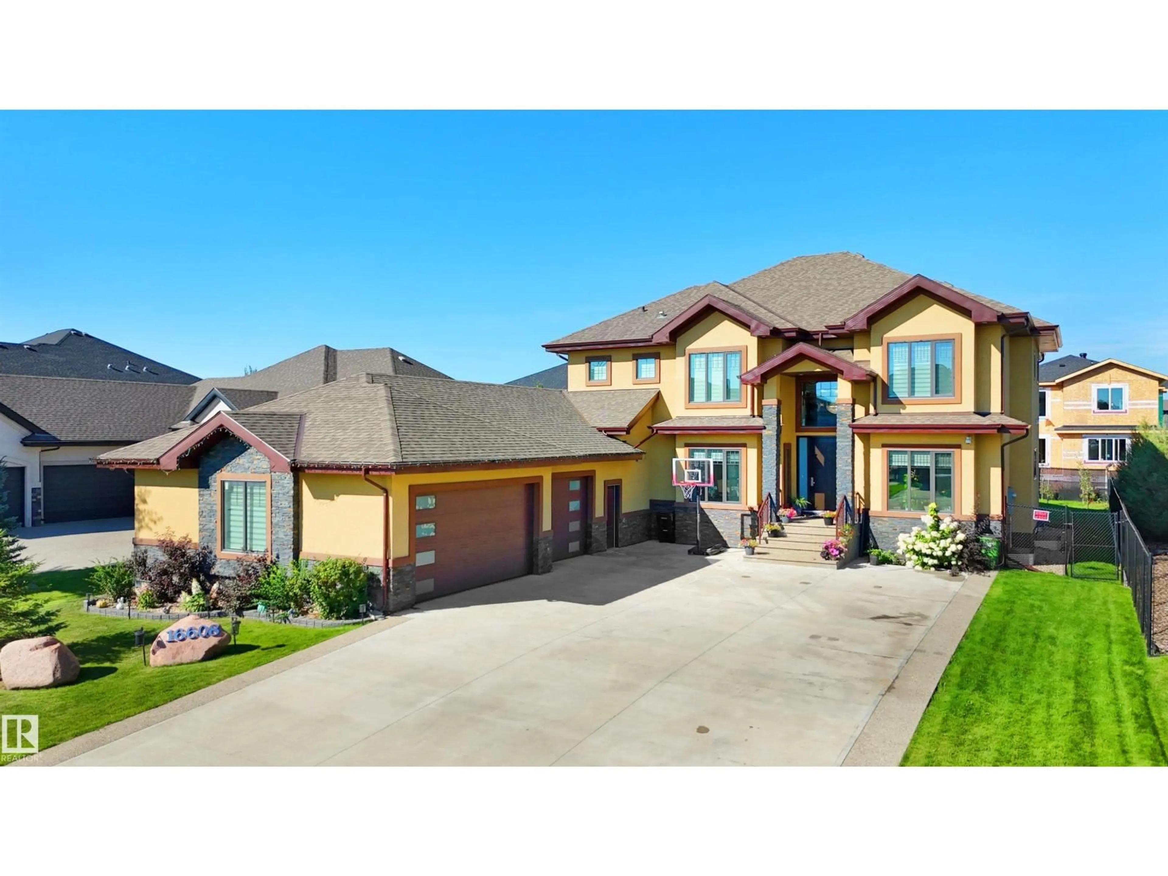 Home with brick exterior material, street for NE - 16608 9 ST, Edmonton Alberta T5Y0P6
