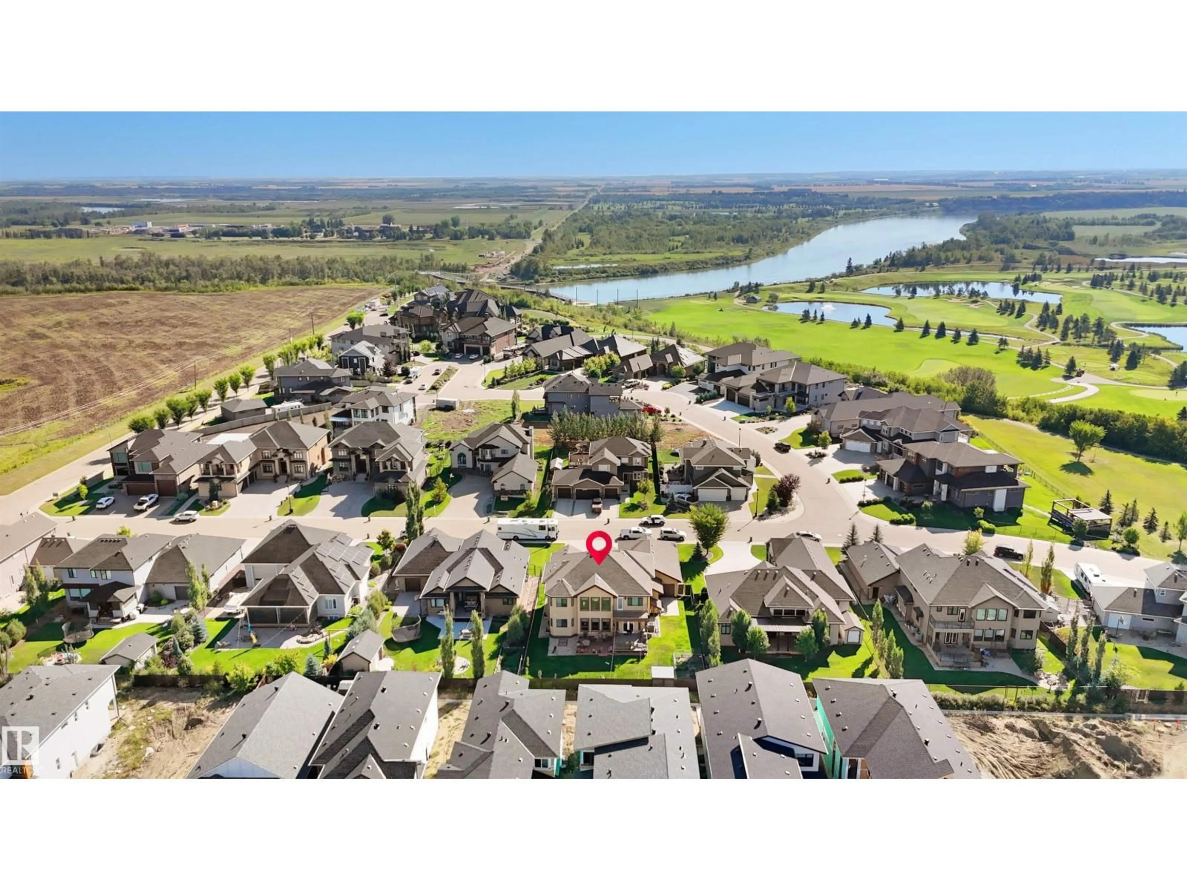 A pic from outside/outdoor area/front of a property/back of a property/a pic from drone, water/lake/river/ocean view for NE - 16608 9 ST, Edmonton Alberta T5Y0P6