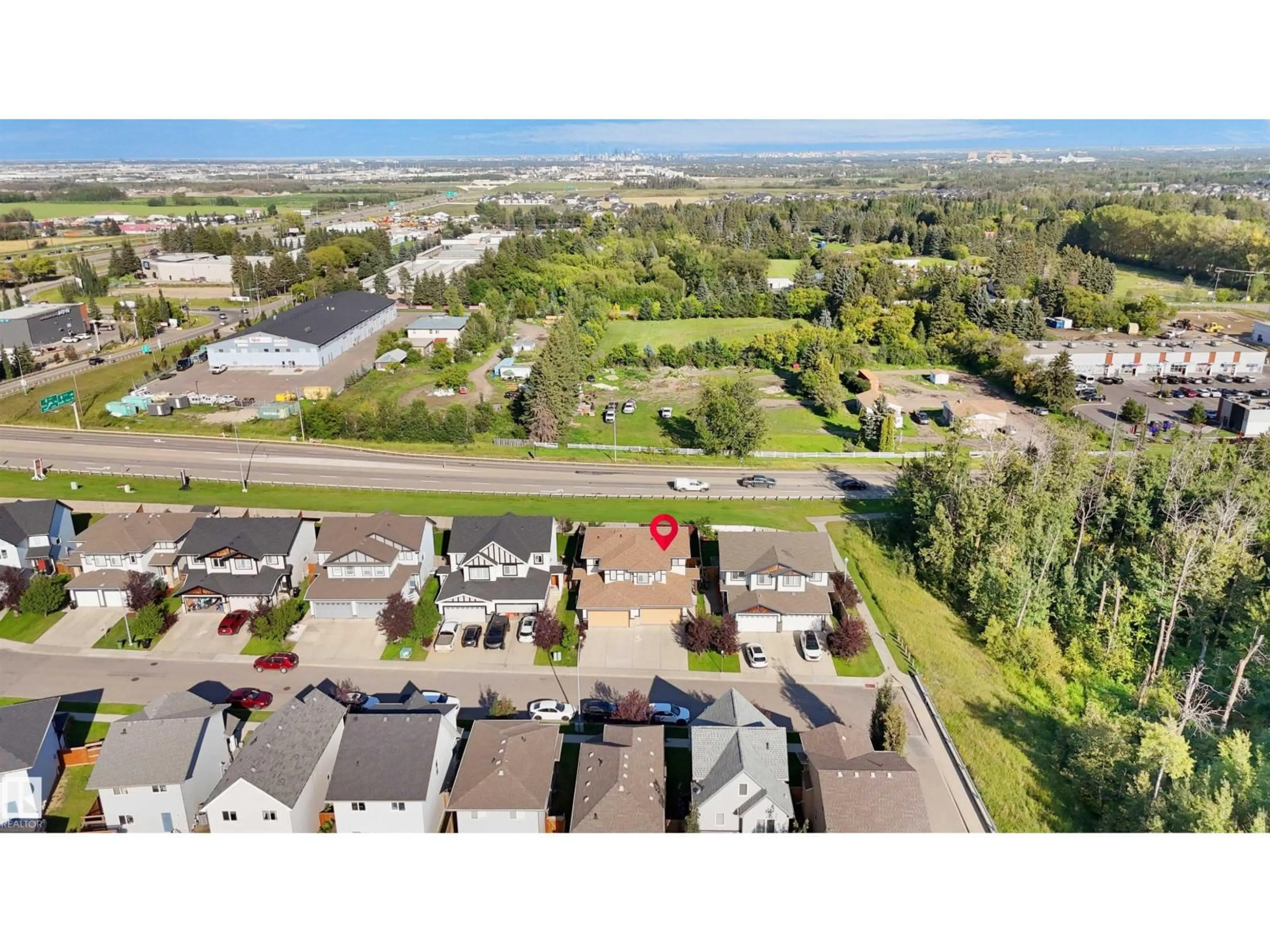 A pic from outside/outdoor area/front of a property/back of a property/a pic from drone, street for NW - 9835 217 ST, Edmonton Alberta T5T4T7