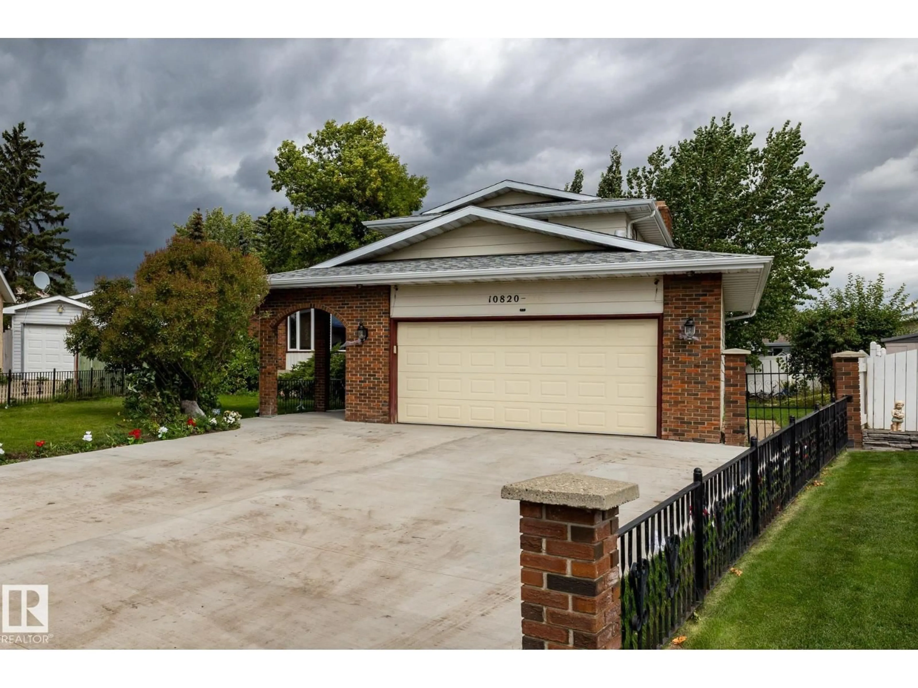 Home with brick exterior material, street for 10820 170 AVENUE NW, Edmonton Alberta T5X3E6