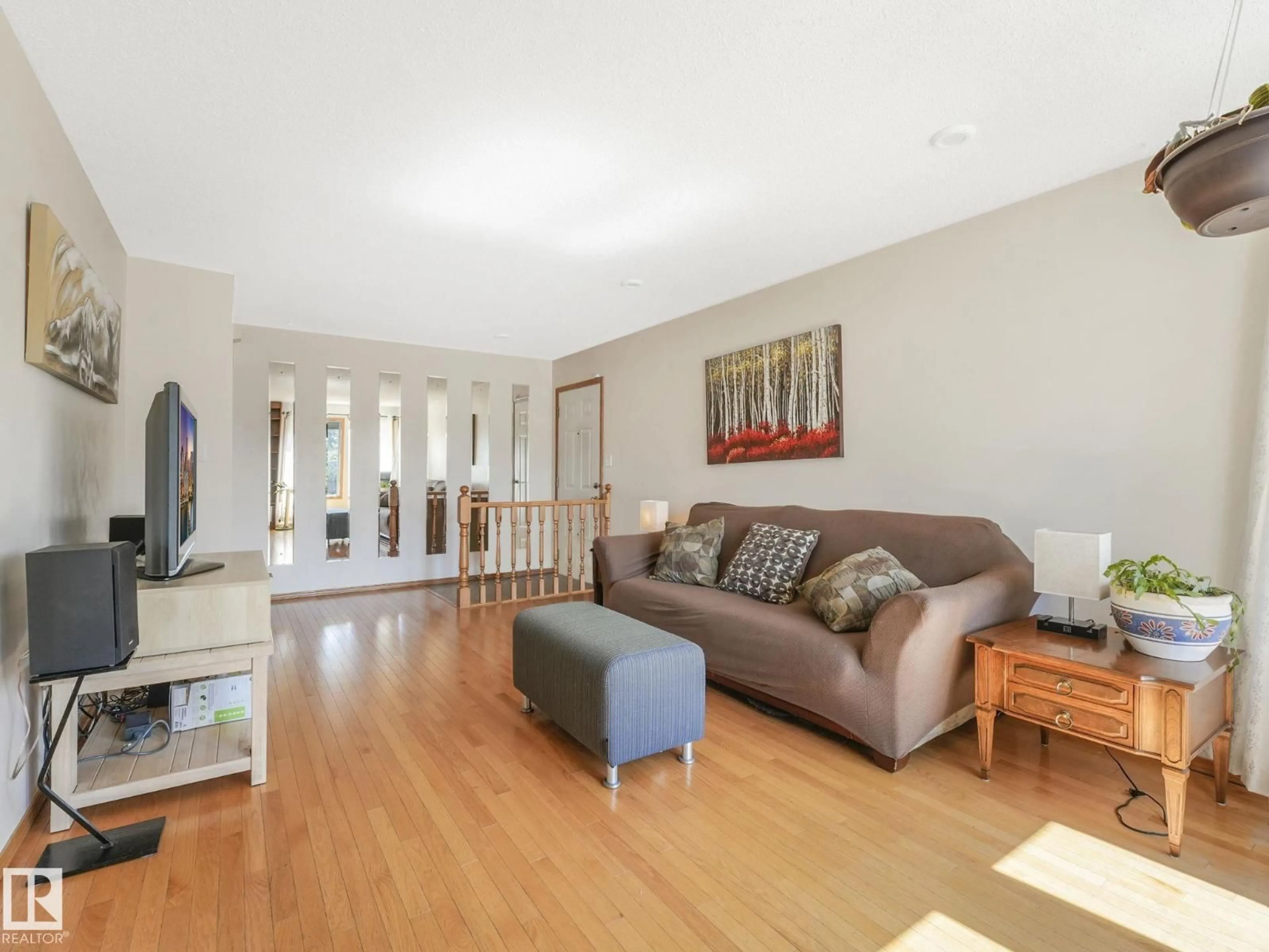 Living room with furniture, unknown for 3608 15 AV, Edmonton Alberta T6L2M3