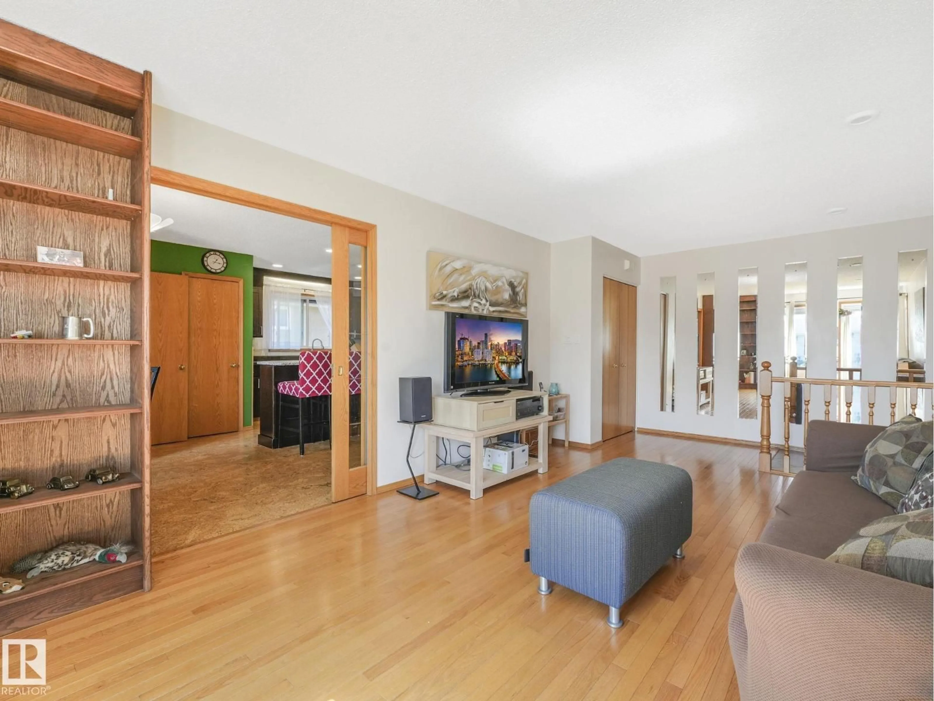 Living room with furniture, wood/laminate floor for 3608 15 AV, Edmonton Alberta T6L2M3