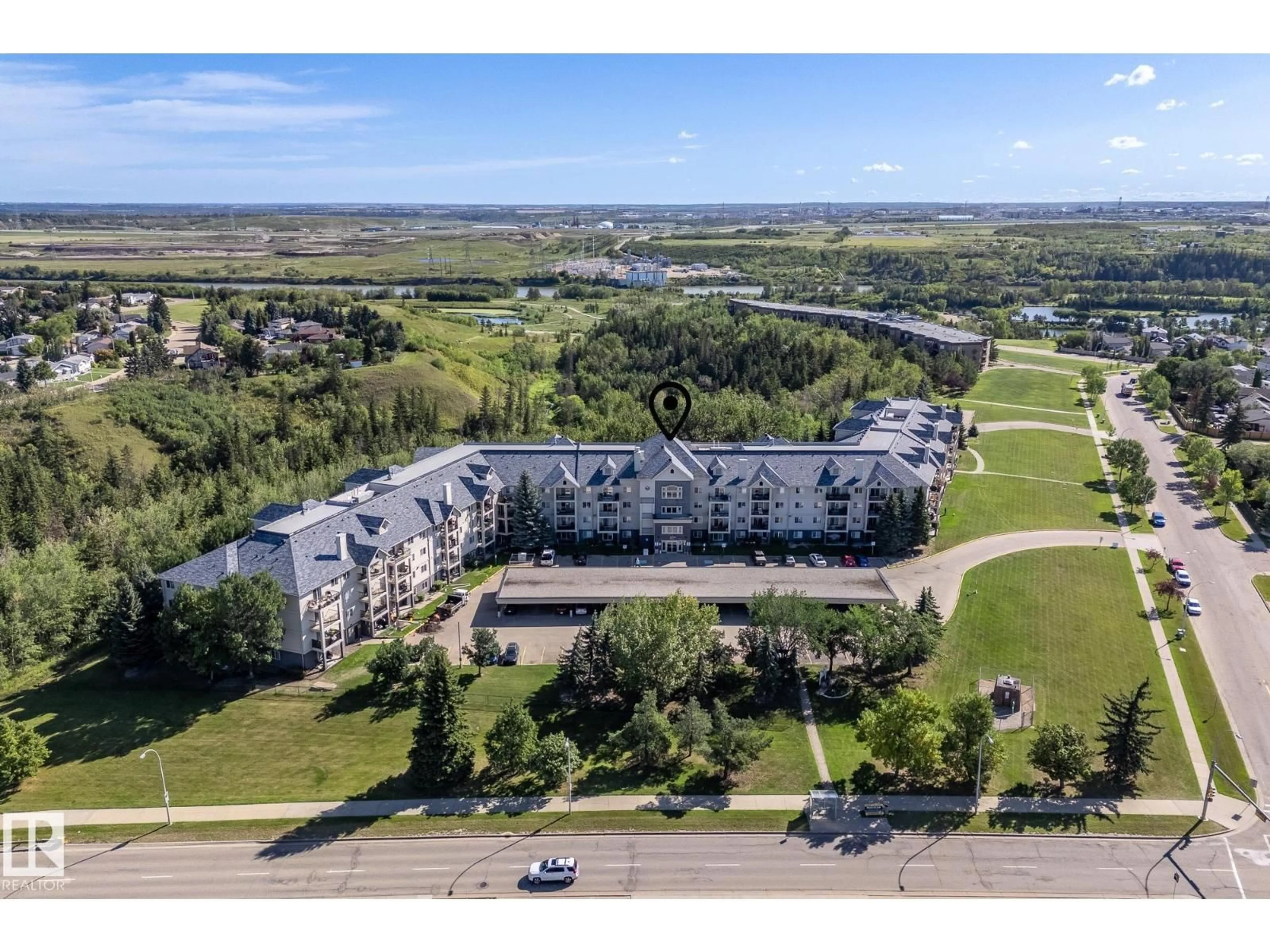 A pic from outside/outdoor area/front of a property/back of a property/a pic from drone, water/lake/river/ocean view for 592 - 225 HOOKE RD, Edmonton Alberta T5A5H2