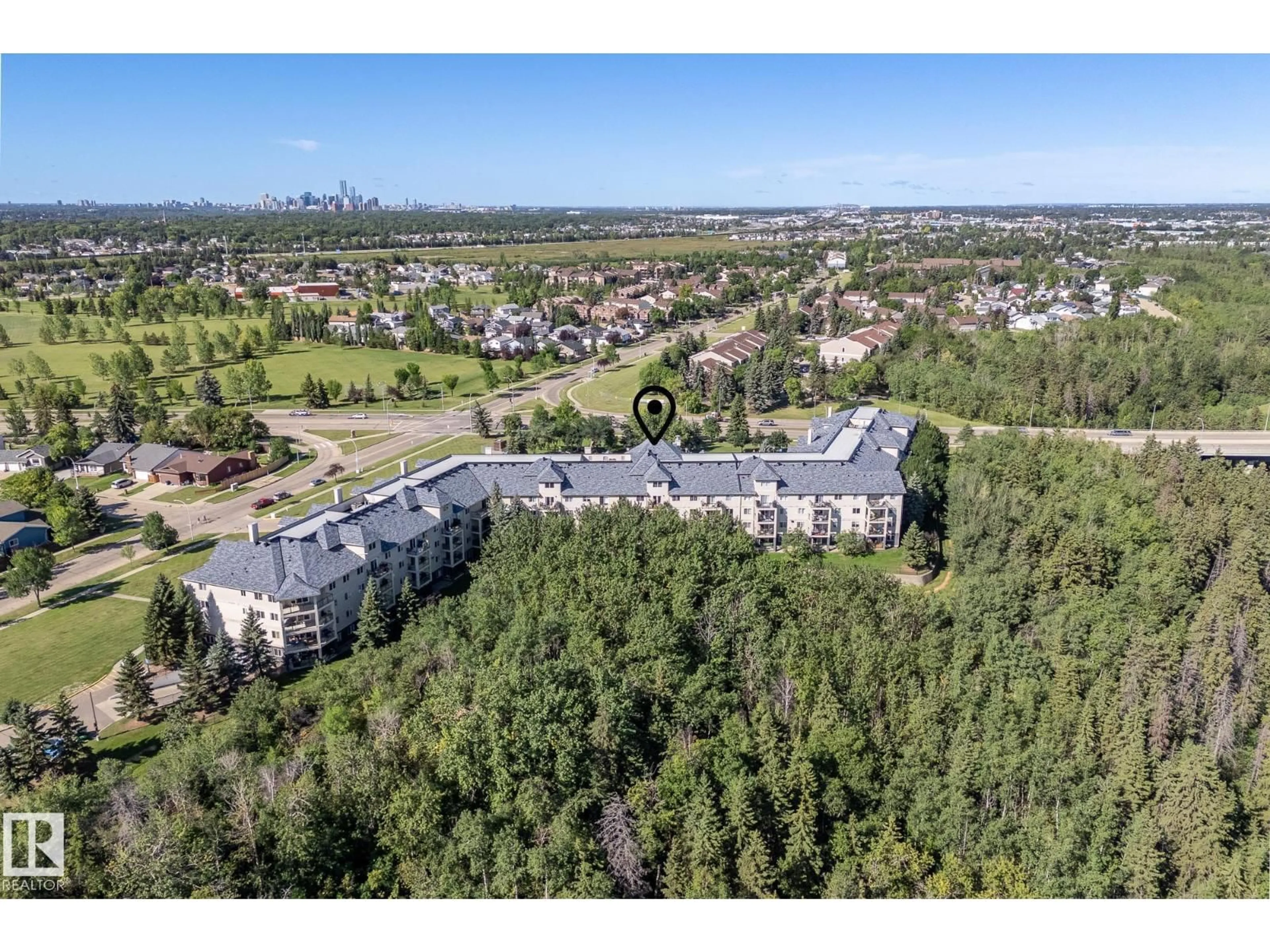 A pic from outside/outdoor area/front of a property/back of a property/a pic from drone, unknown for 592 - 225 HOOKE RD, Edmonton Alberta T5A5H2