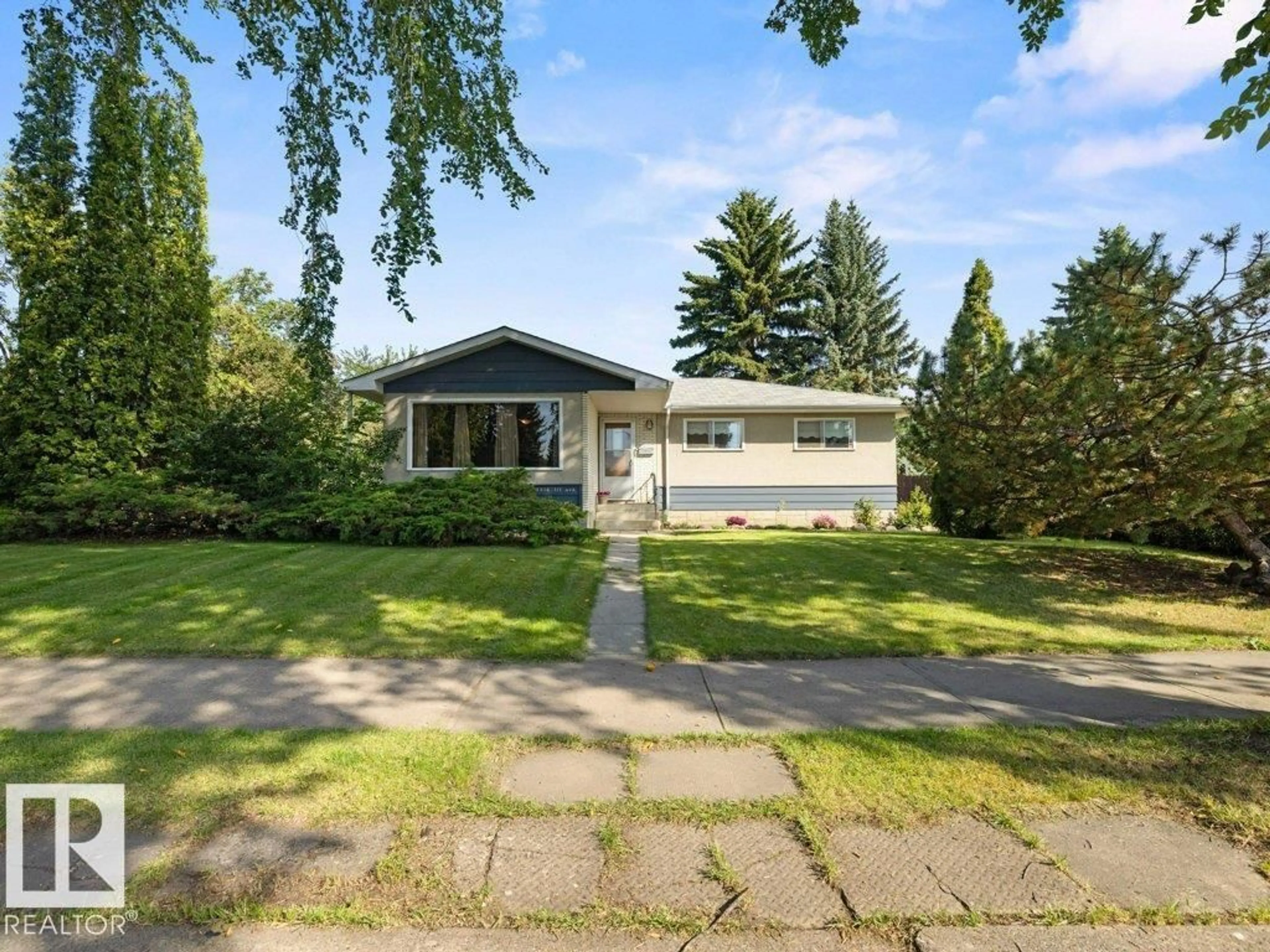 Home with vinyl exterior material, street for NW - 3516 111 AV, Edmonton Alberta T5W0J6