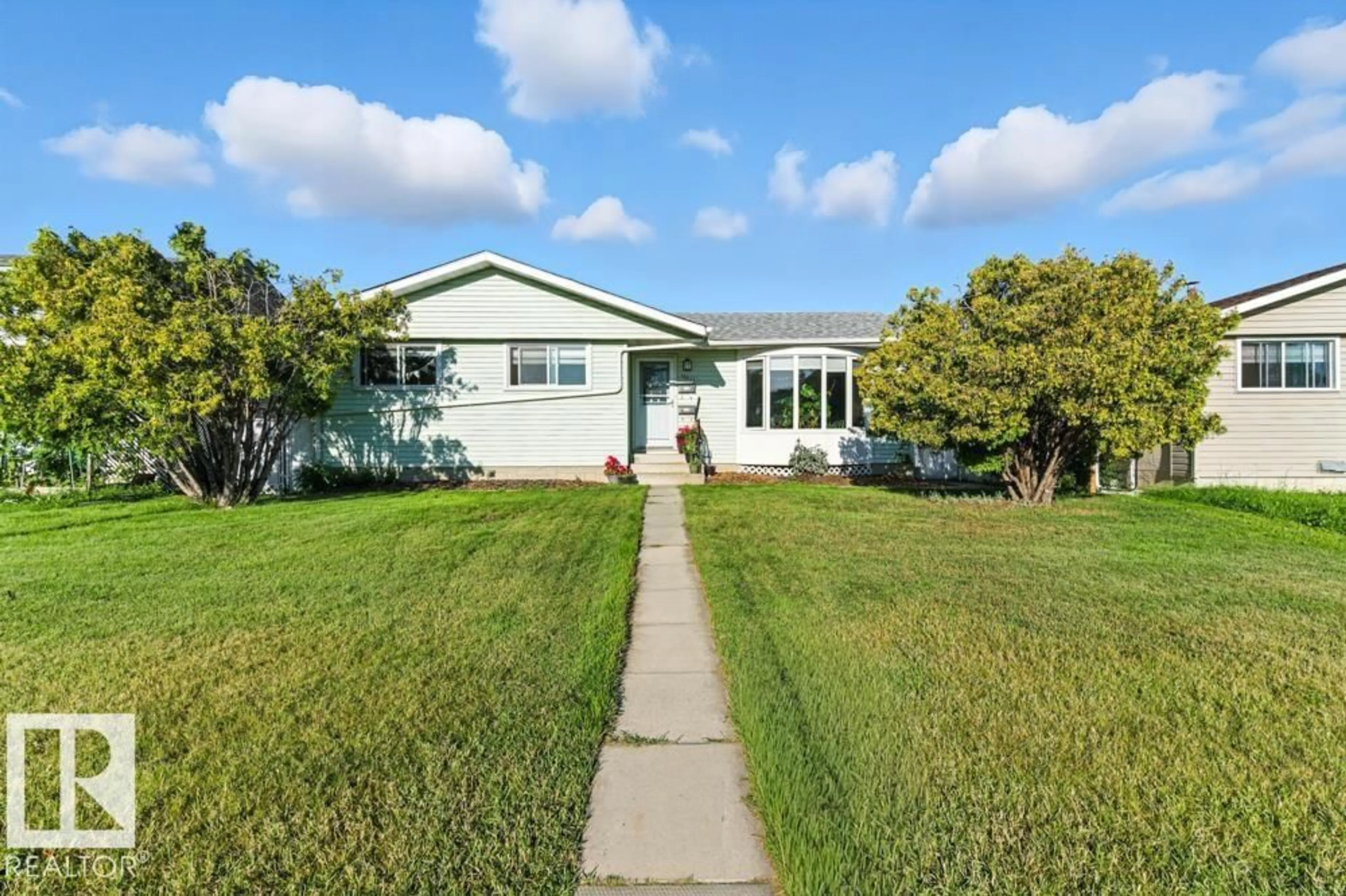 Home with vinyl exterior material, street for 15012 74 ST, Edmonton Alberta T5C0Y7