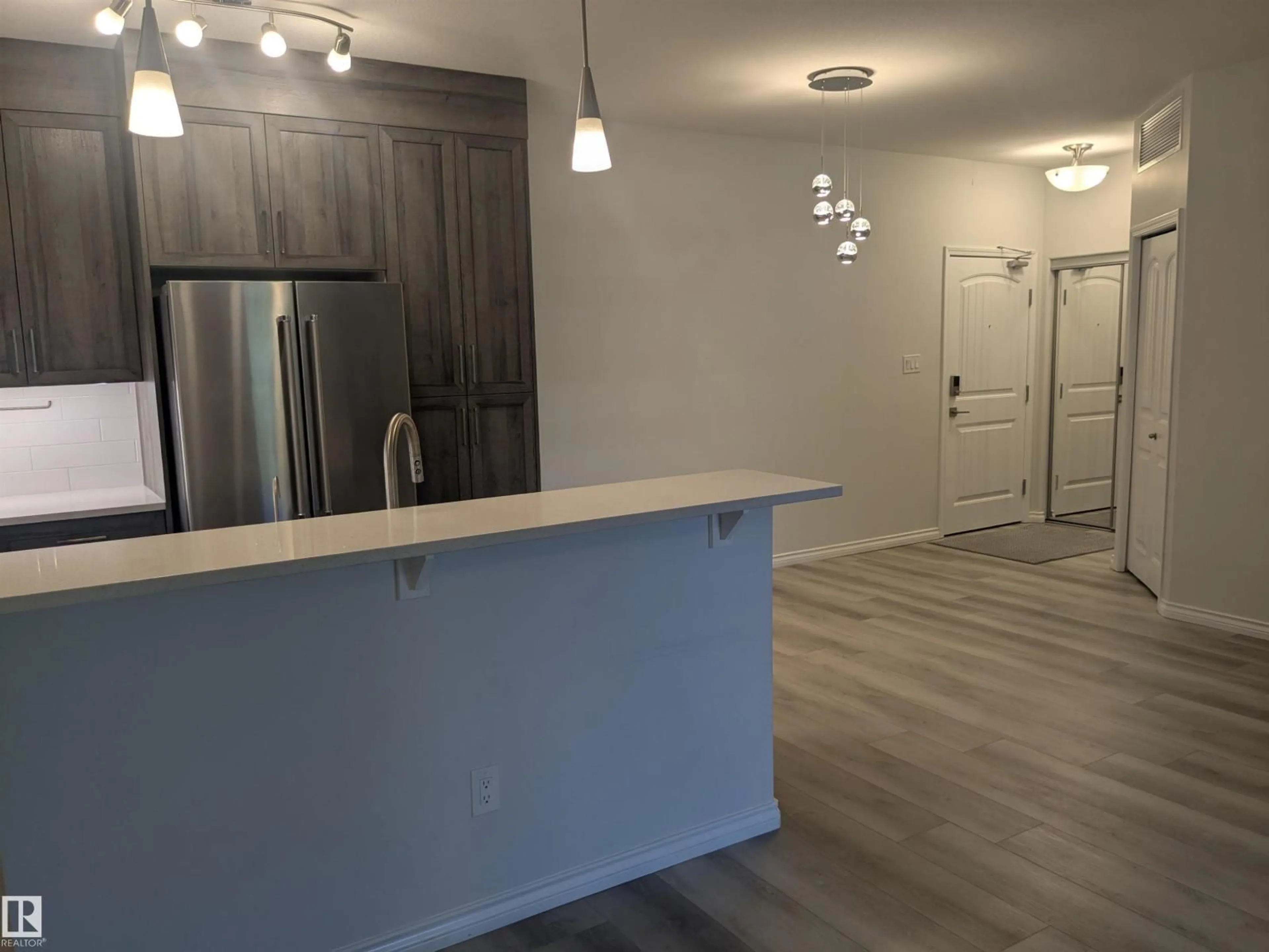 Open concept kitchen, unknown for #118 - 2503 HANNA CR, Edmonton Alberta T6R0H1