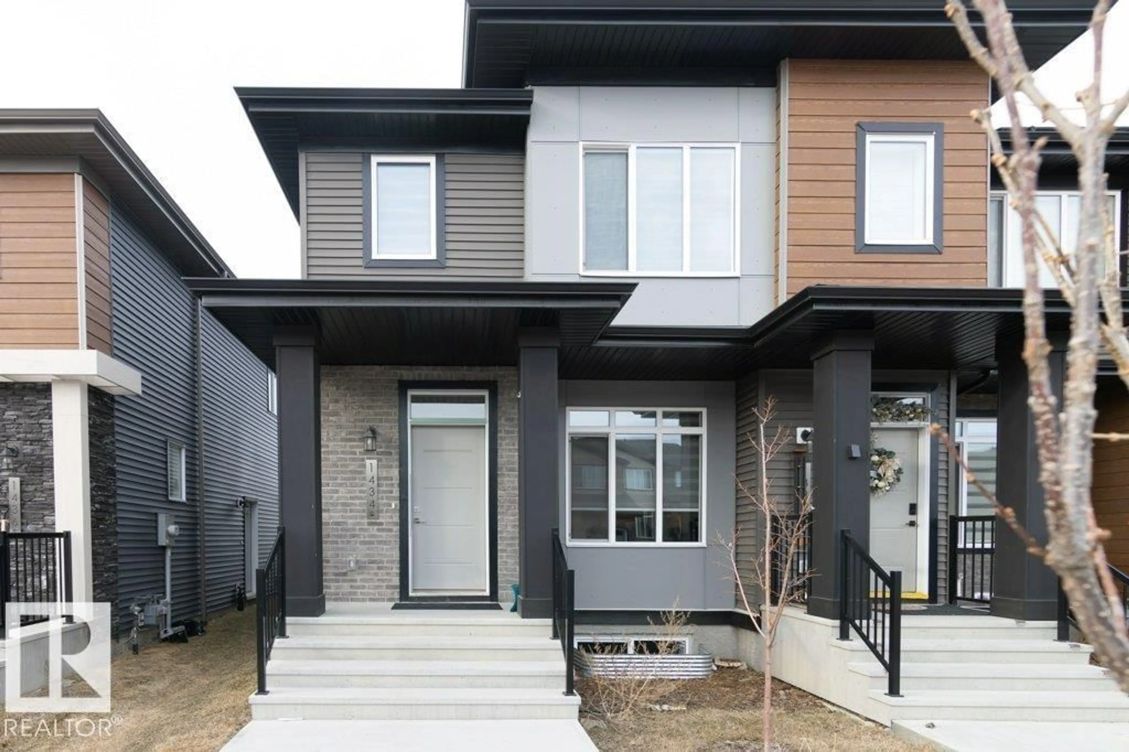 Home with vinyl exterior material, street for 1434 KESWICK DR, Edmonton Alberta T6W4T9