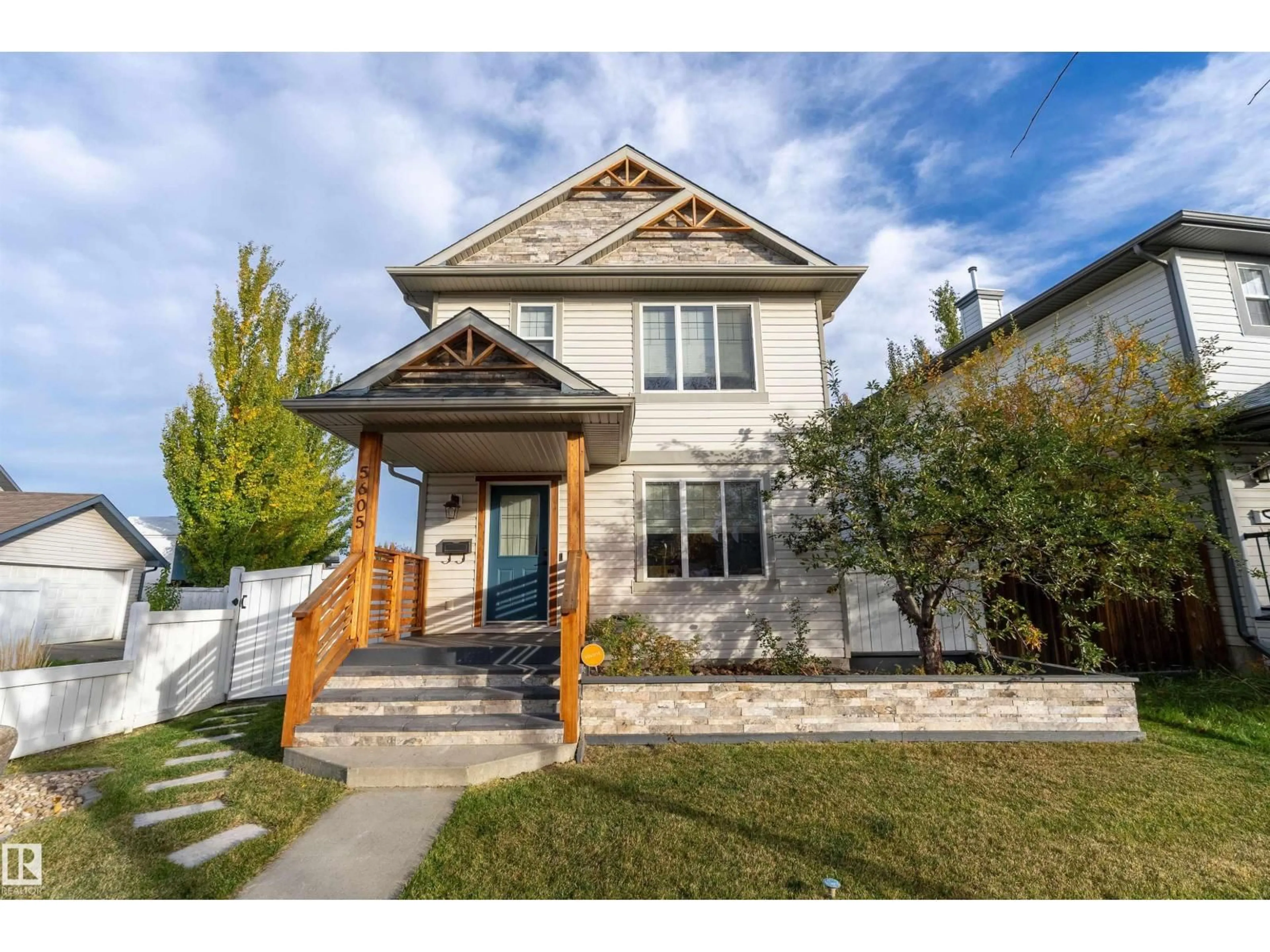 Home with vinyl exterior material, street for 5605 STEVENS CR, Edmonton Alberta T6R0A4