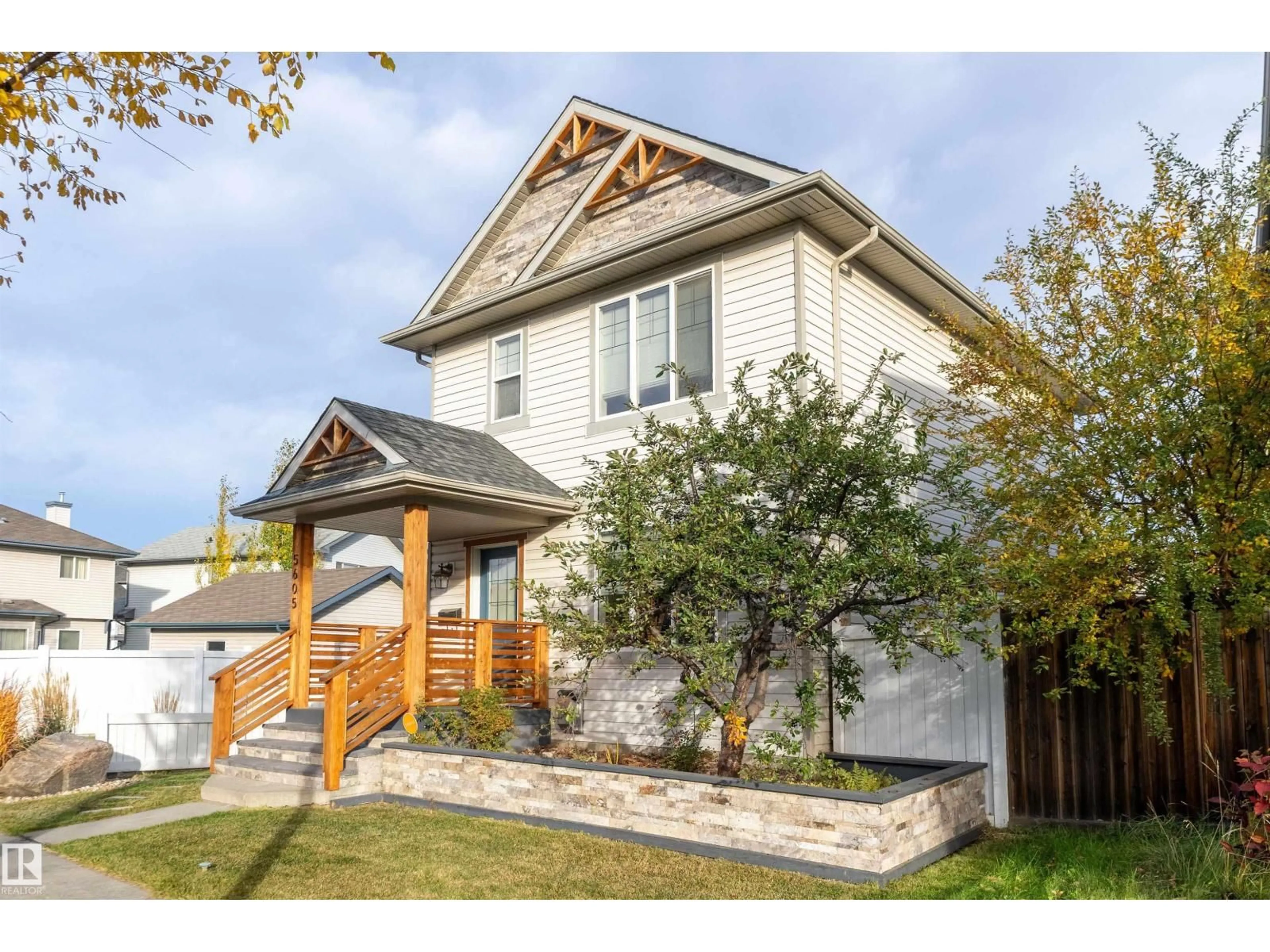 Home with vinyl exterior material, street for 5605 STEVENS CR, Edmonton Alberta T6R0A4