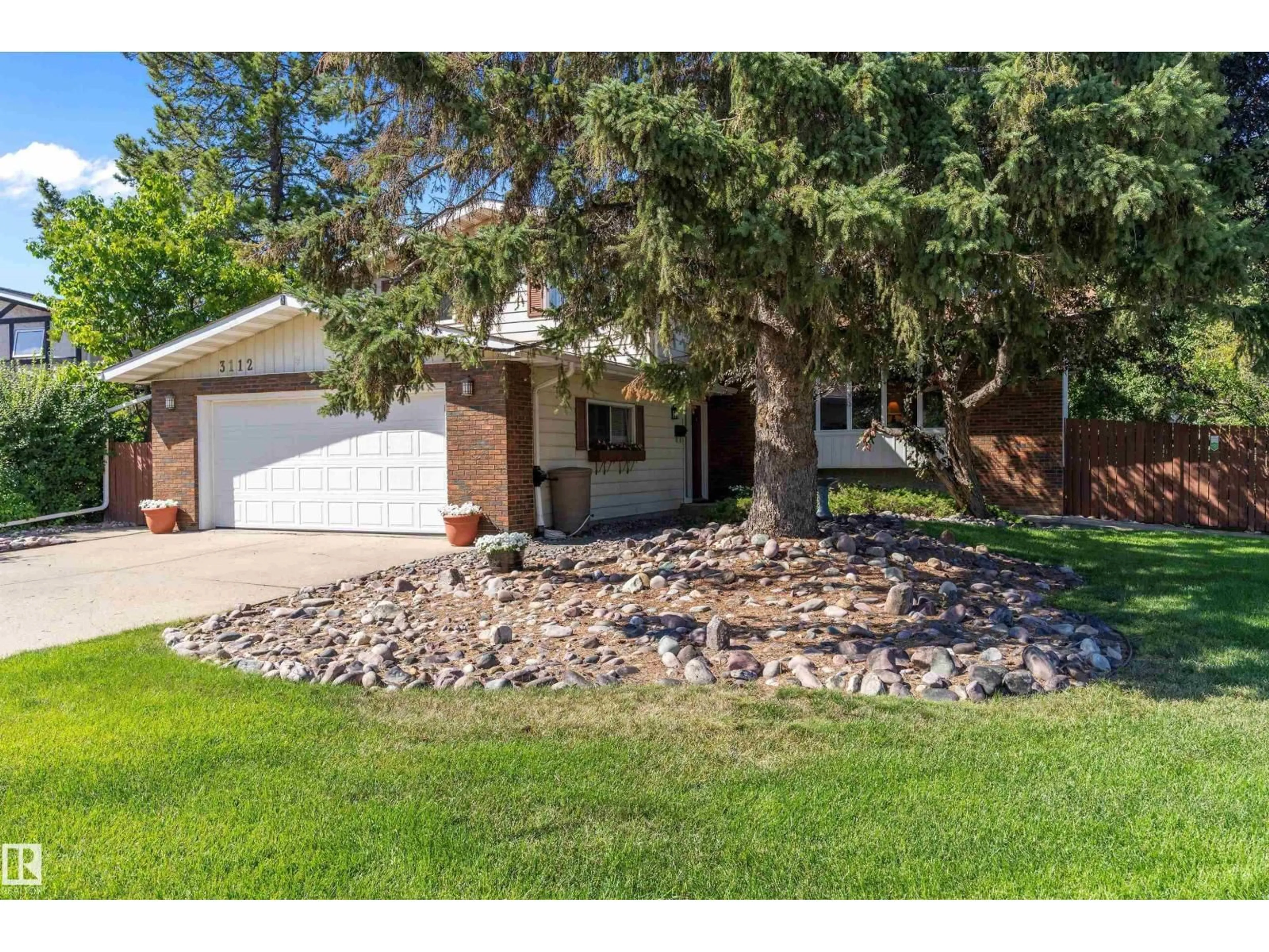 Home with brick exterior material, street for 3112 109 ST, Edmonton Alberta T6J3E6