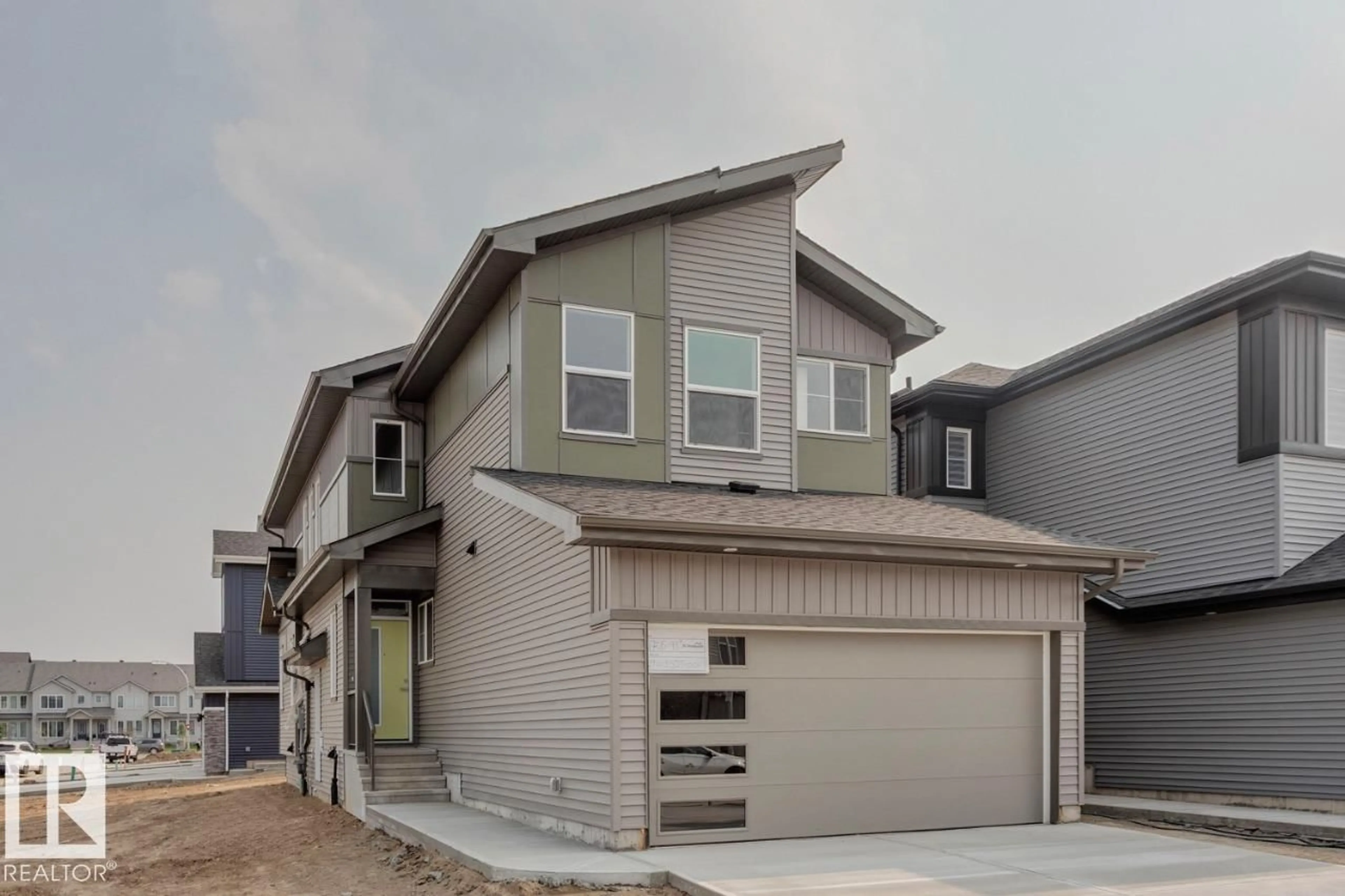 Home with vinyl exterior material, street for 22705 93A AV, Edmonton Alberta T5T7V7