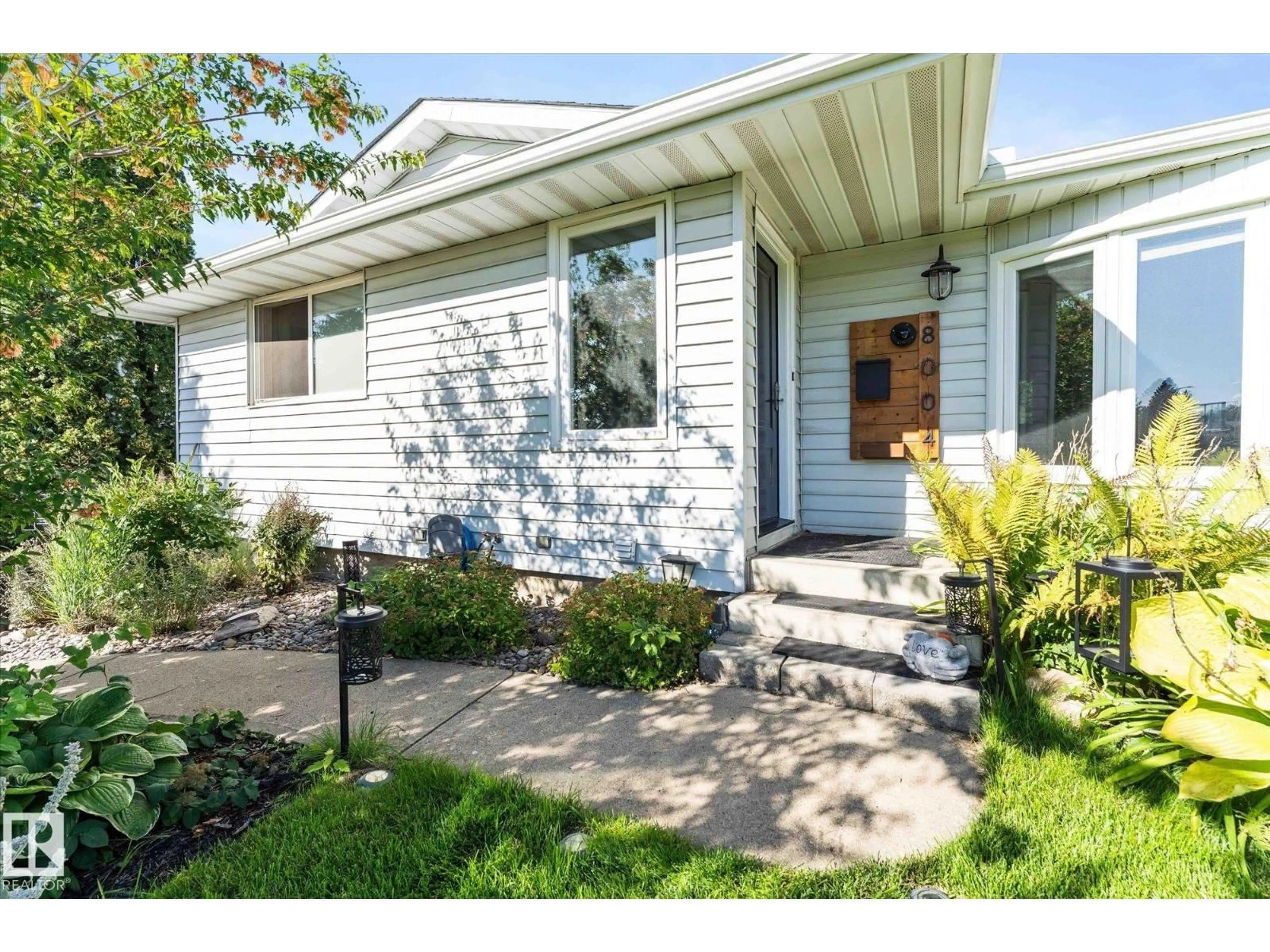 Home with vinyl exterior material, street for NW - 8004 180 ST, Edmonton Alberta T5T0T3