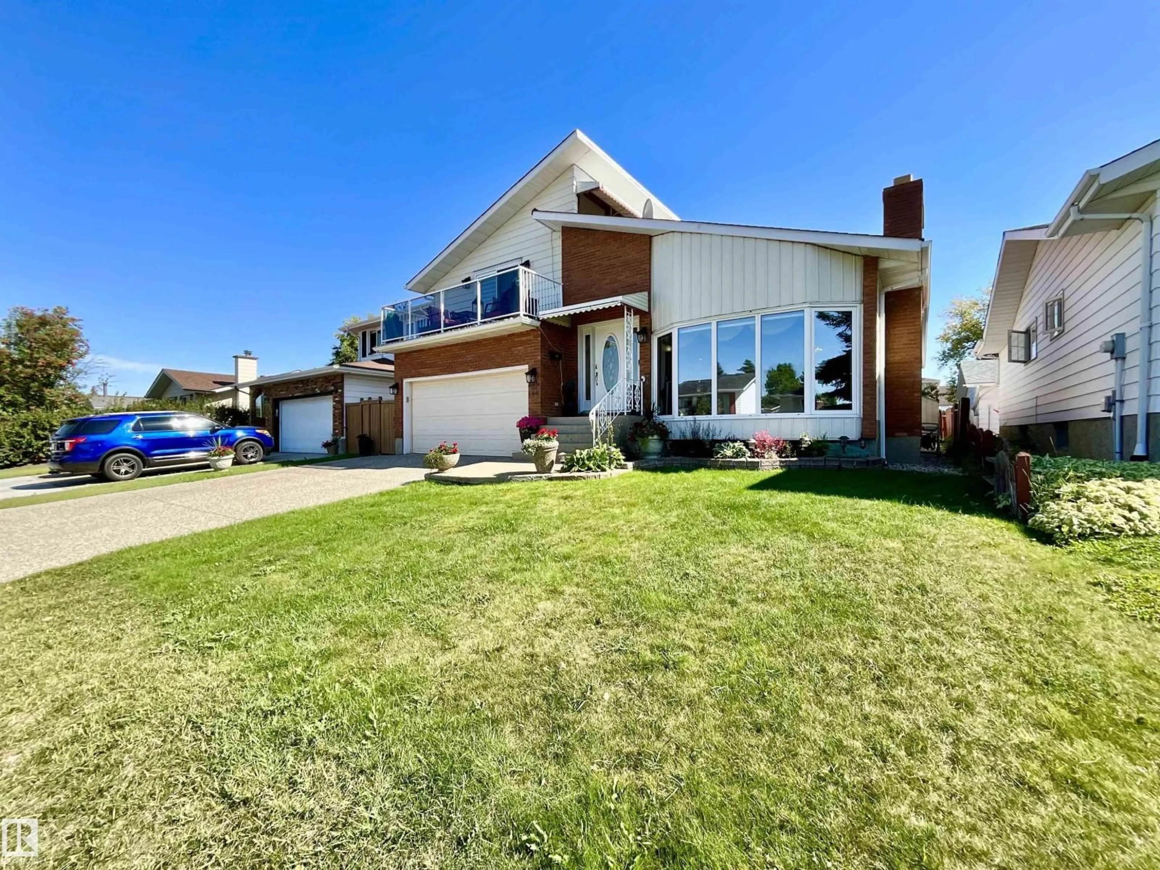 Home with vinyl exterior material, unknown for 11031 166 AV, Edmonton Alberta T5X1Y2