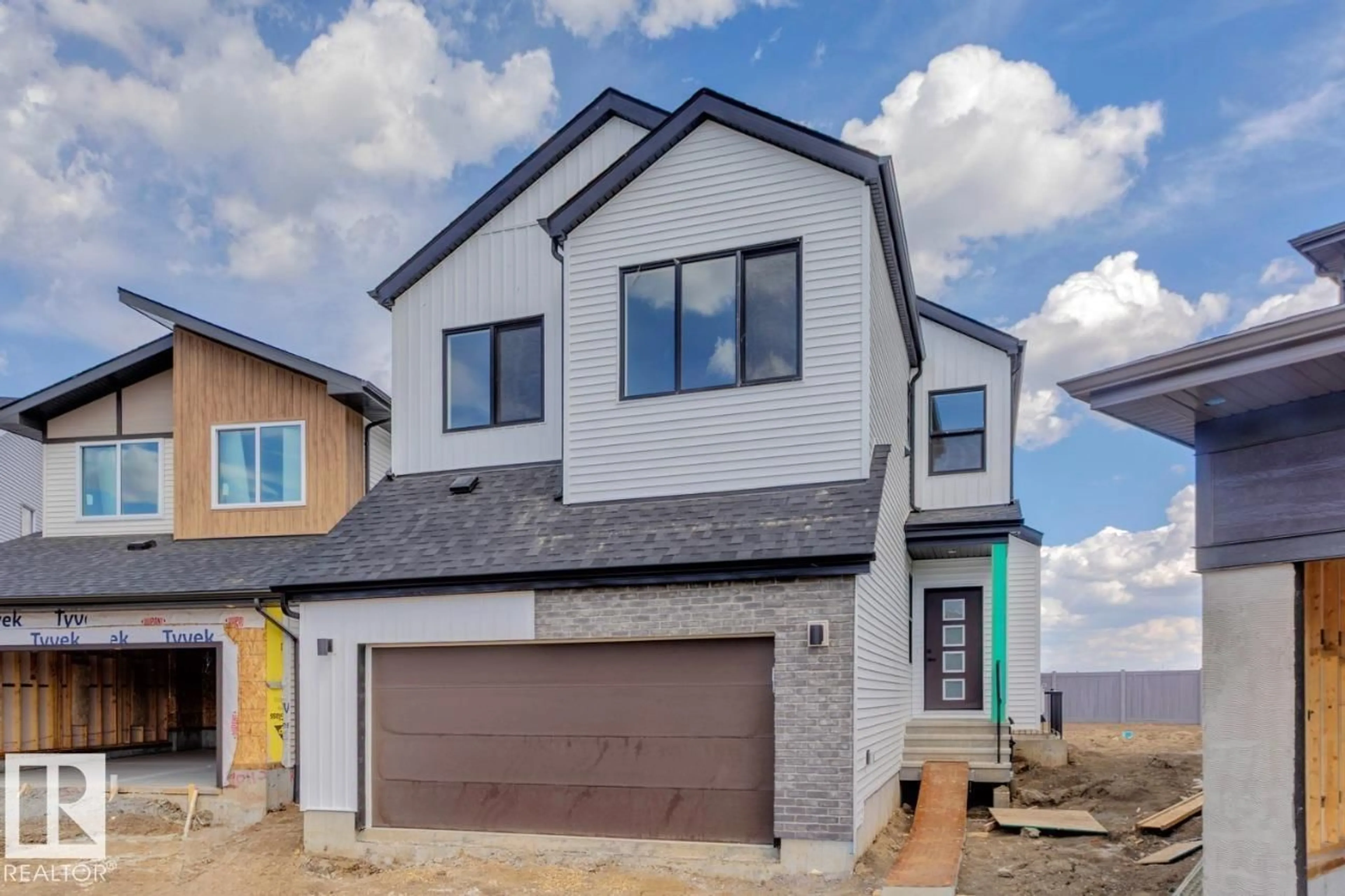 Home with brick exterior material, street for 19015 20 AV, Edmonton Alberta T6M3A7