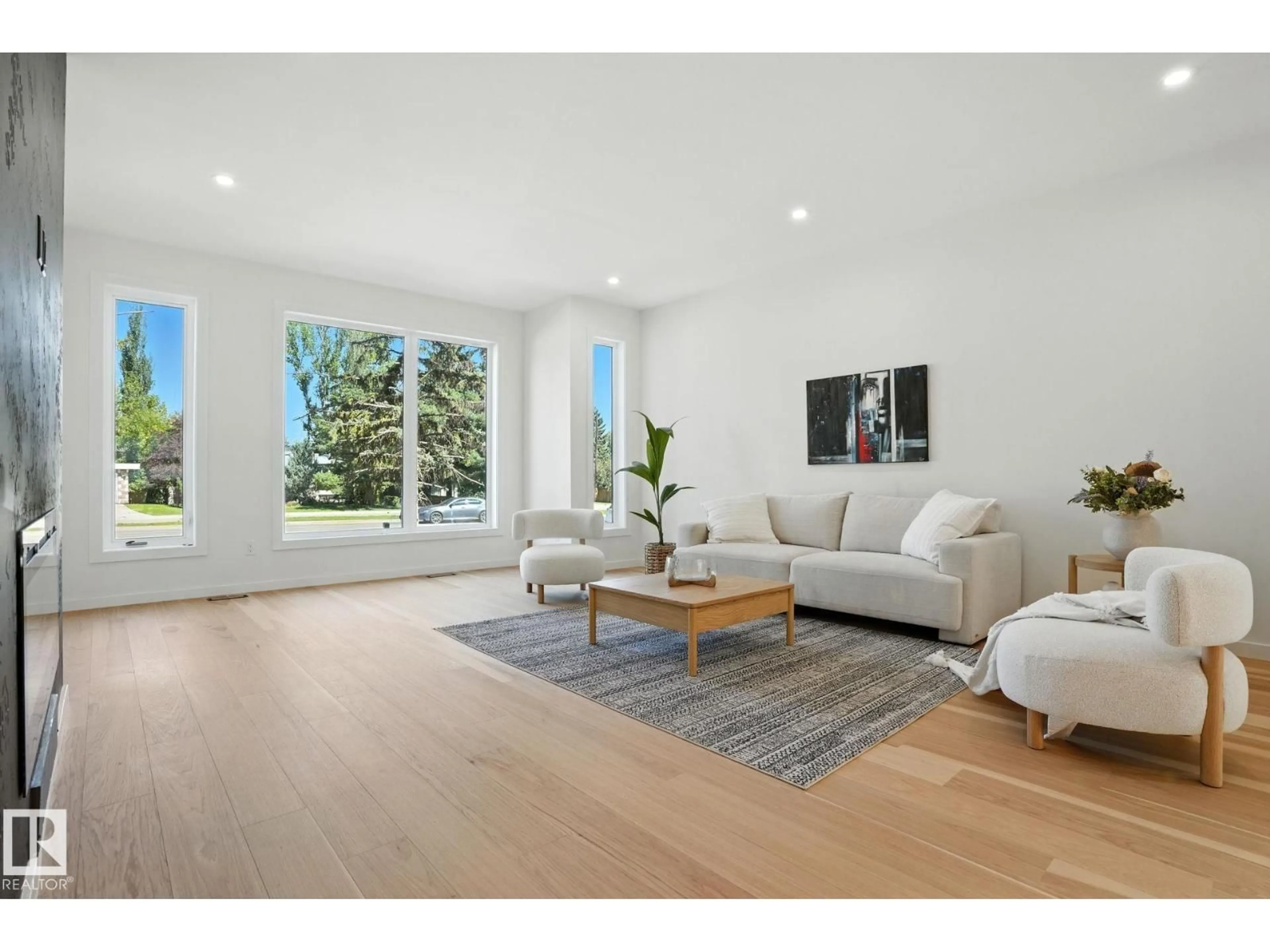Living room with furniture, wood/laminate floor for 13809 BUENA VISTA RD, Edmonton Alberta T5R5R9