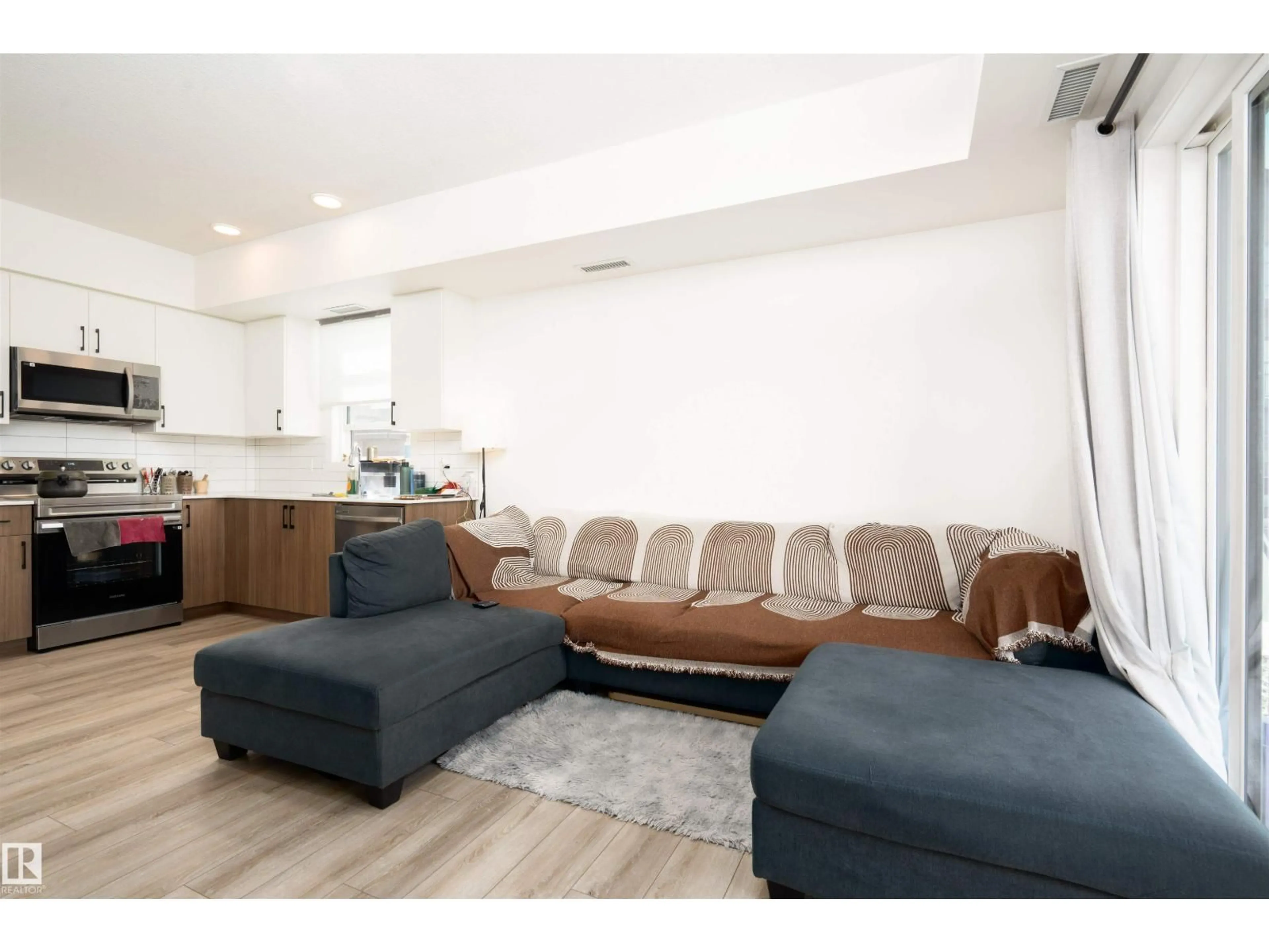 Living room with furniture, unknown for #108 - 9227 228 STREET, Edmonton Alberta T5T7R9