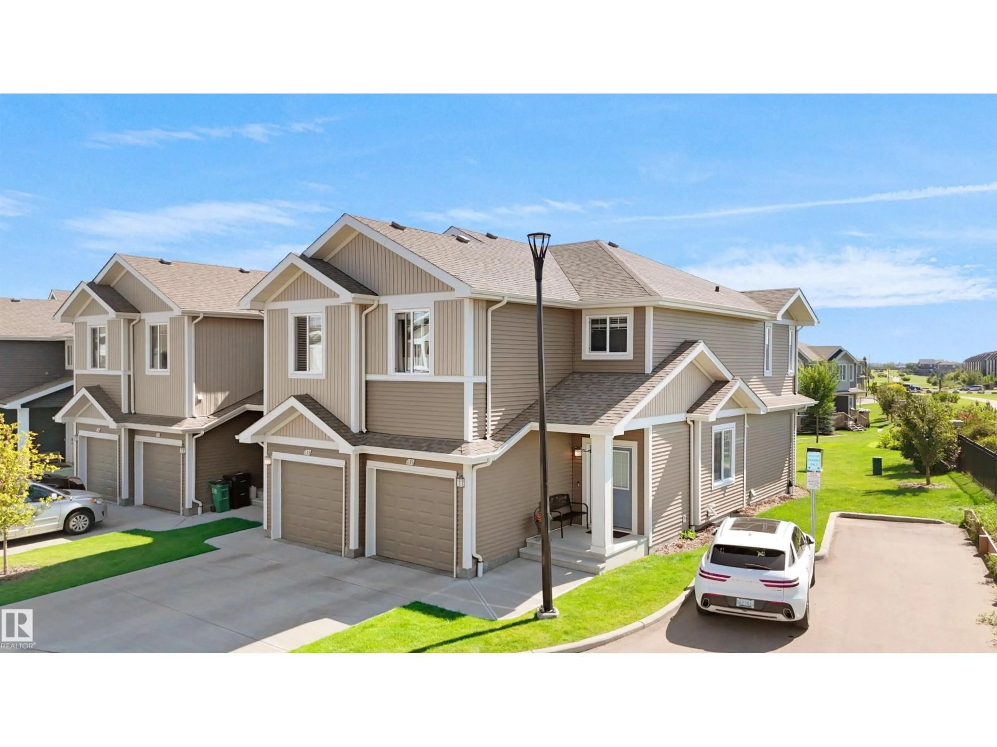 A pic from outside/outdoor area/front of a property/back of a property/a pic from drone, street for #39 - 6004 ROSENTHAL WY, Edmonton Alberta T5T7L1