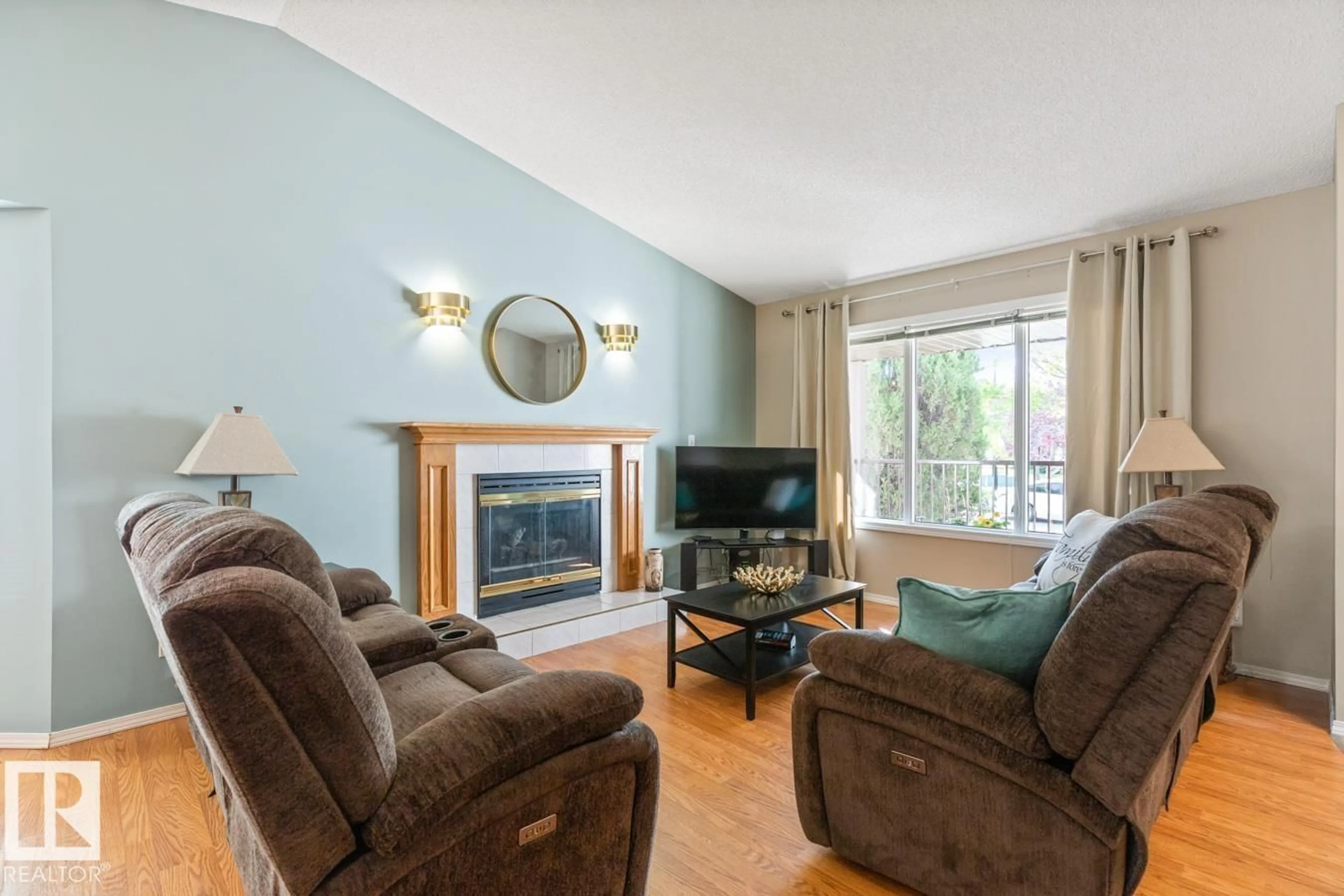 Living room with furniture, wood/laminate floor for 288 REGENCY DR, Sherwood Park Alberta T8A5P4