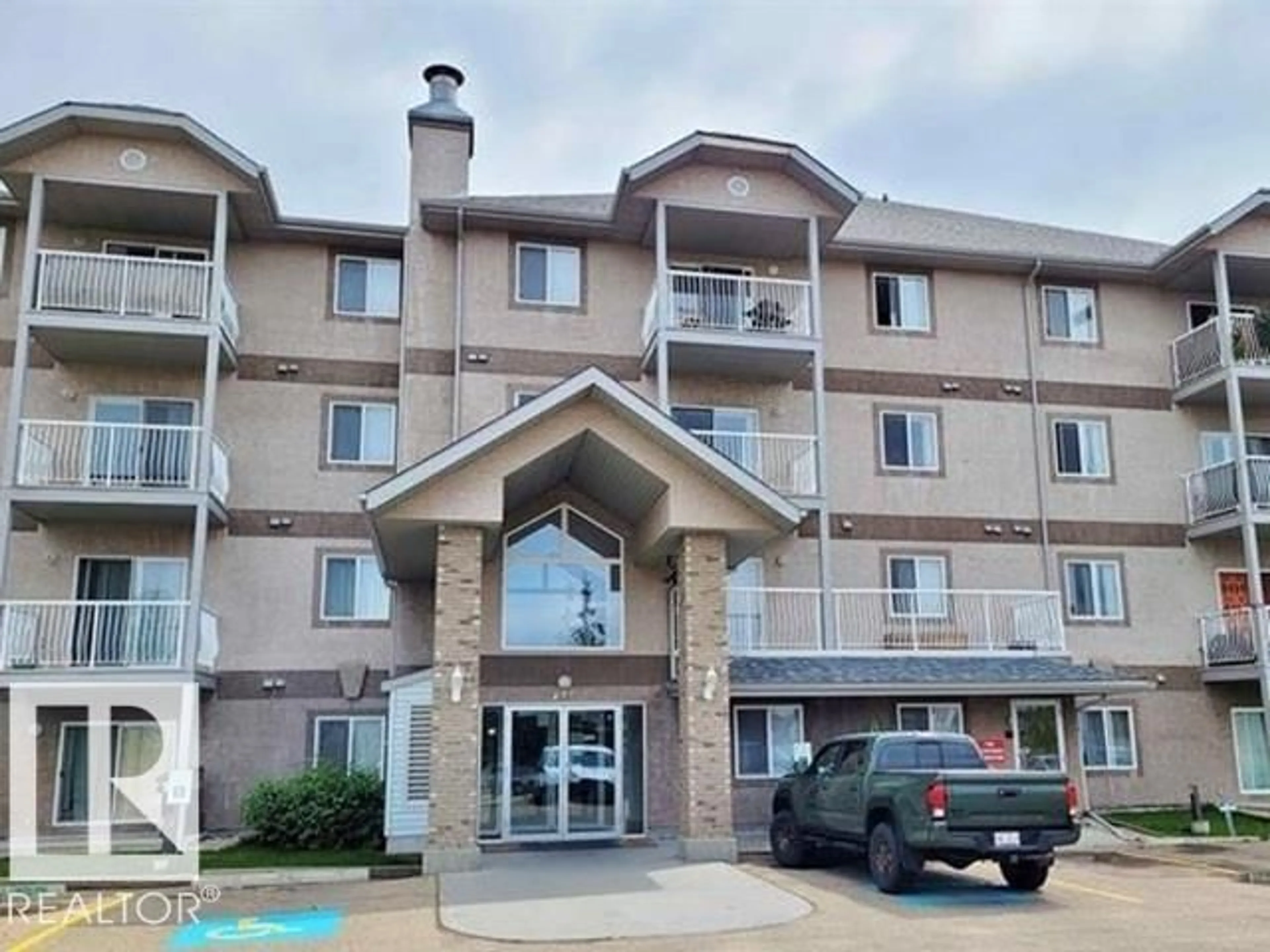 A pic from outside/outdoor area/front of a property/back of a property/a pic from drone, unknown for 240 - 120 SPRUCE RIDGE RD, Spruce Grove Alberta T7X0G5
