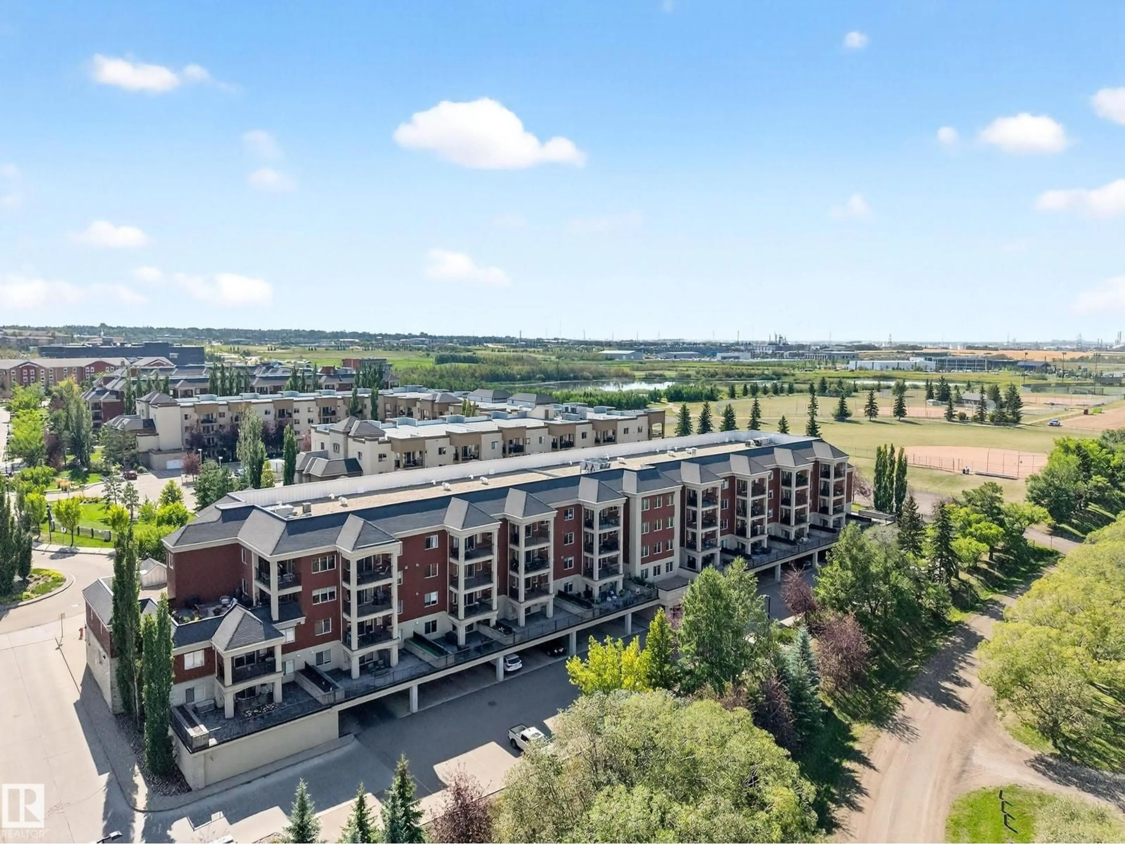 A pic from outside/outdoor area/front of a property/back of a property/a pic from drone, unknown for 308 - 500 PALISADES WY, Sherwood Park Alberta T8H0H7