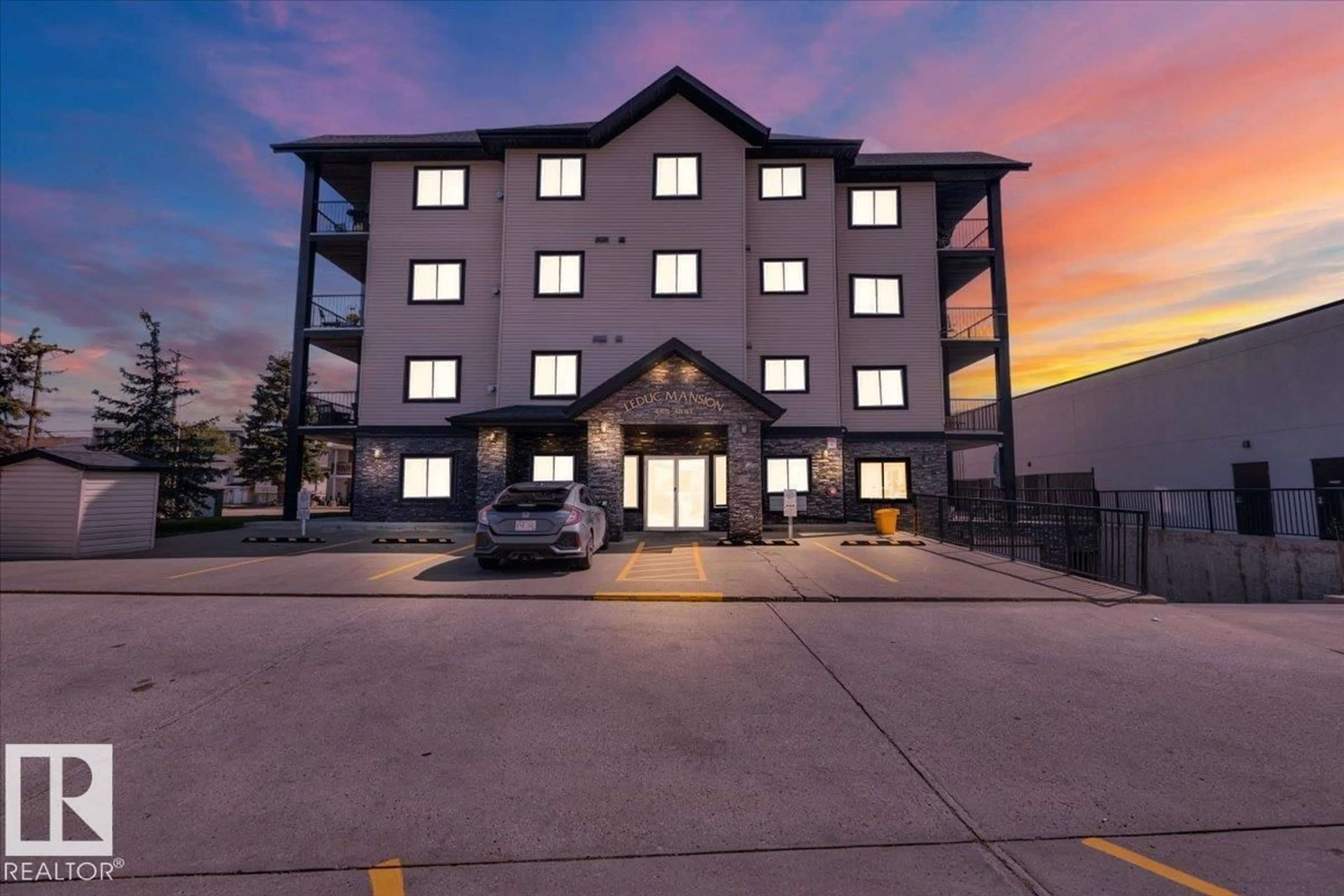 A pic from outside/outdoor area/front of a property/back of a property/a pic from drone, building for 301 - 4415 48 ST, Leduc Alberta T9E5Y3