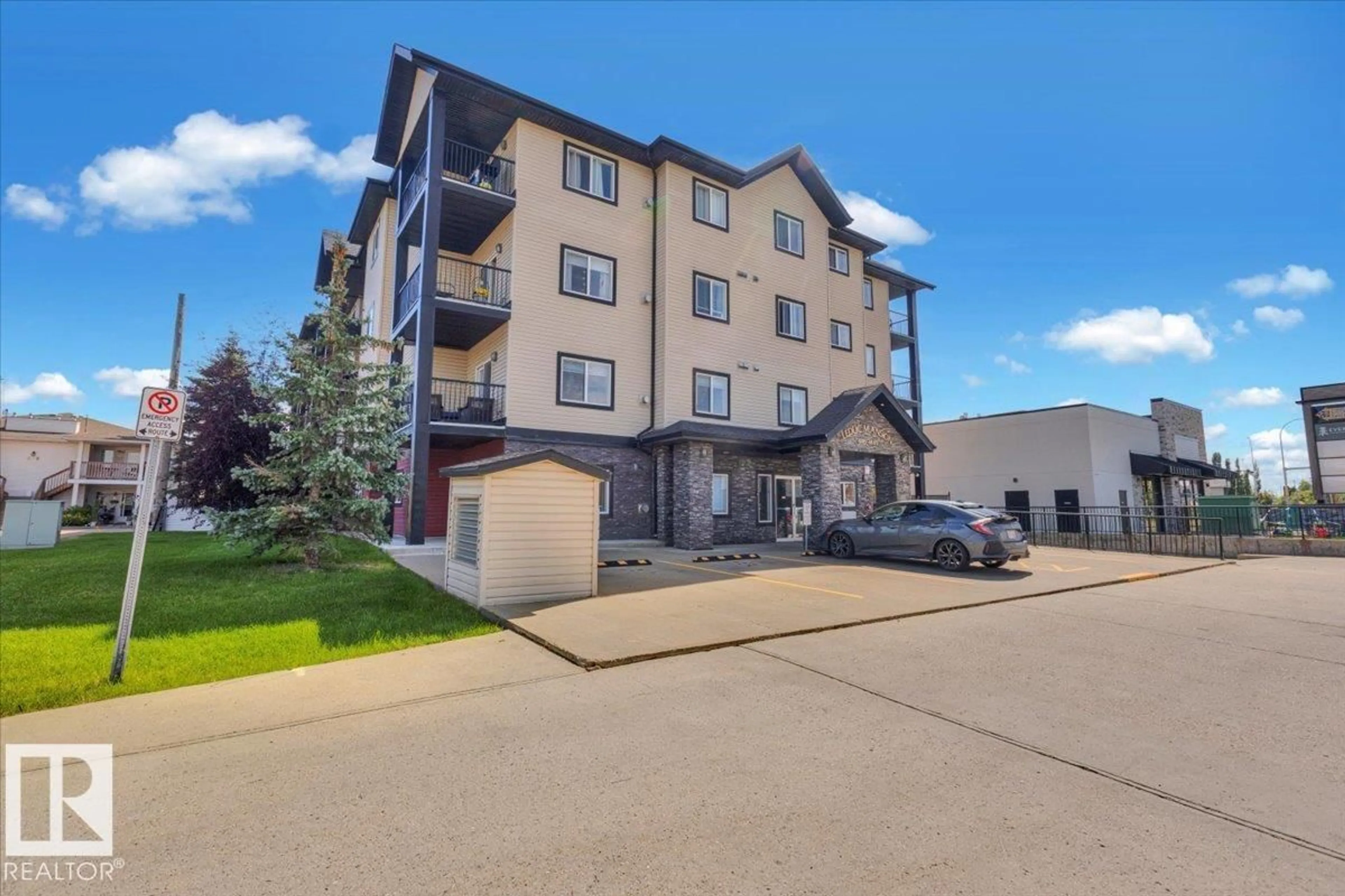A pic from outside/outdoor area/front of a property/back of a property/a pic from drone, building for 301 - 4415 48 ST, Leduc Alberta T9E5Y3