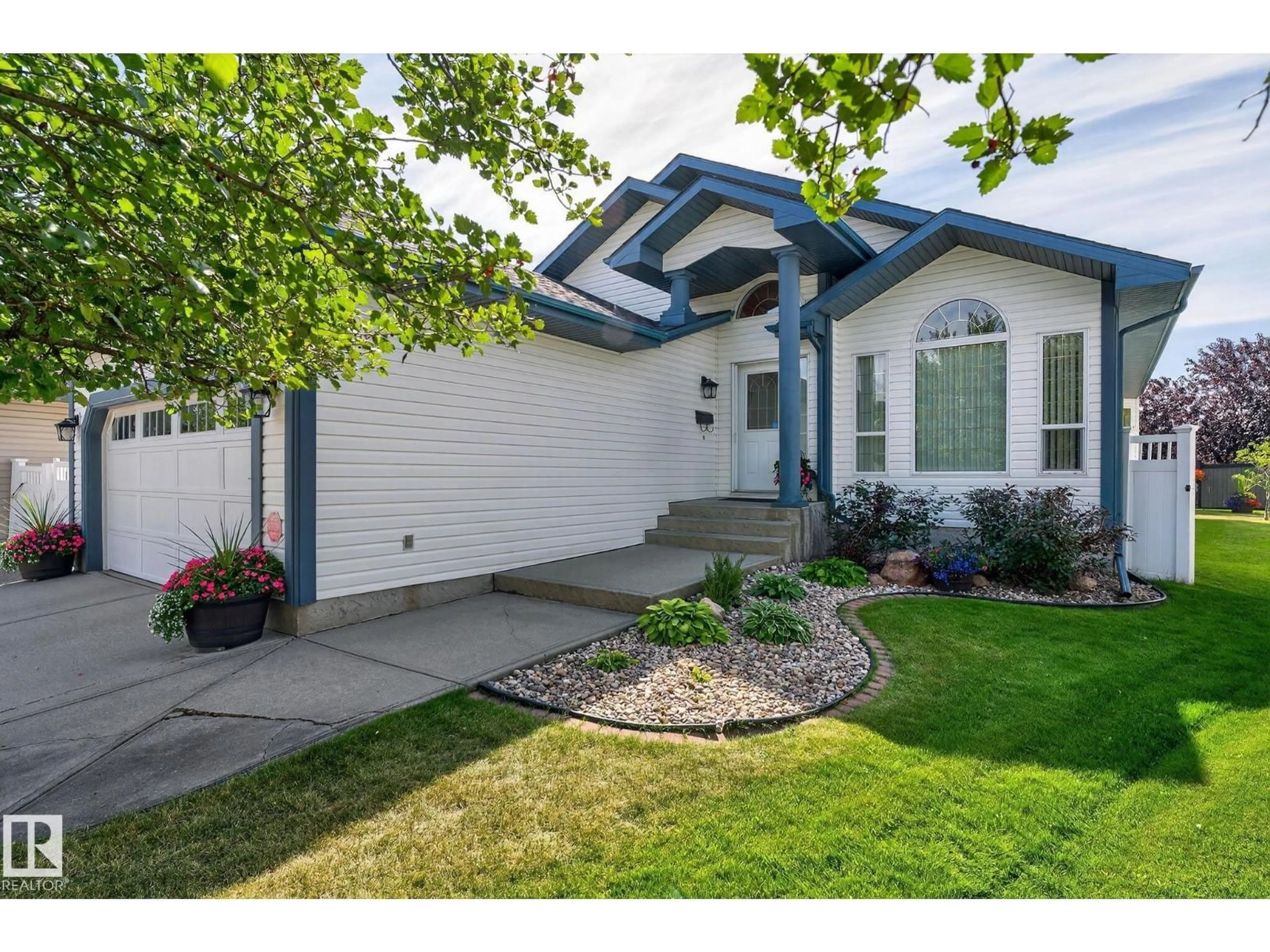 Home with vinyl exterior material, street for 16222 84 ST, Edmonton Alberta T5Z3N8