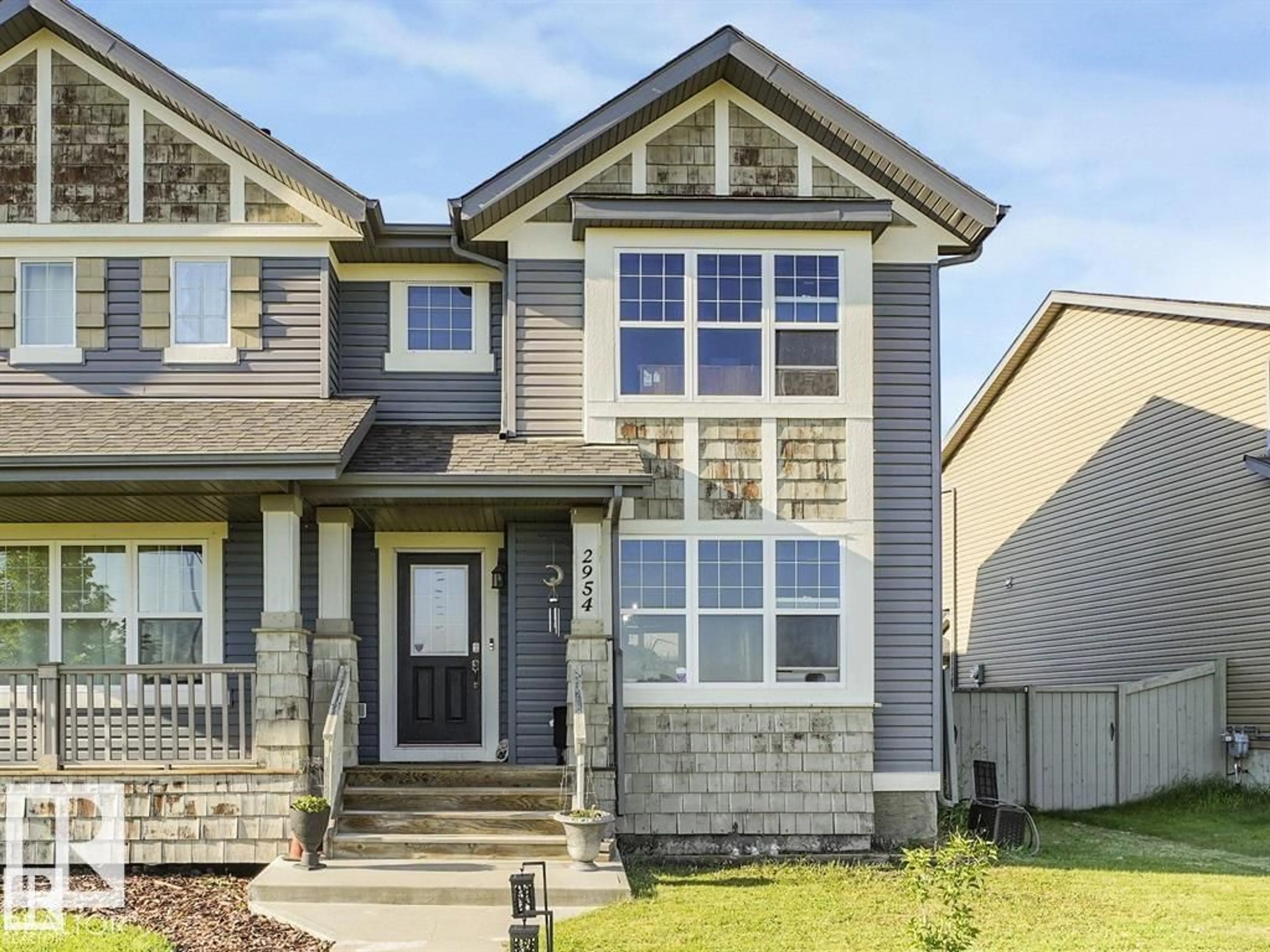 Home with vinyl exterior material, street for 2954 18A AV, Edmonton Alberta T6T0N7