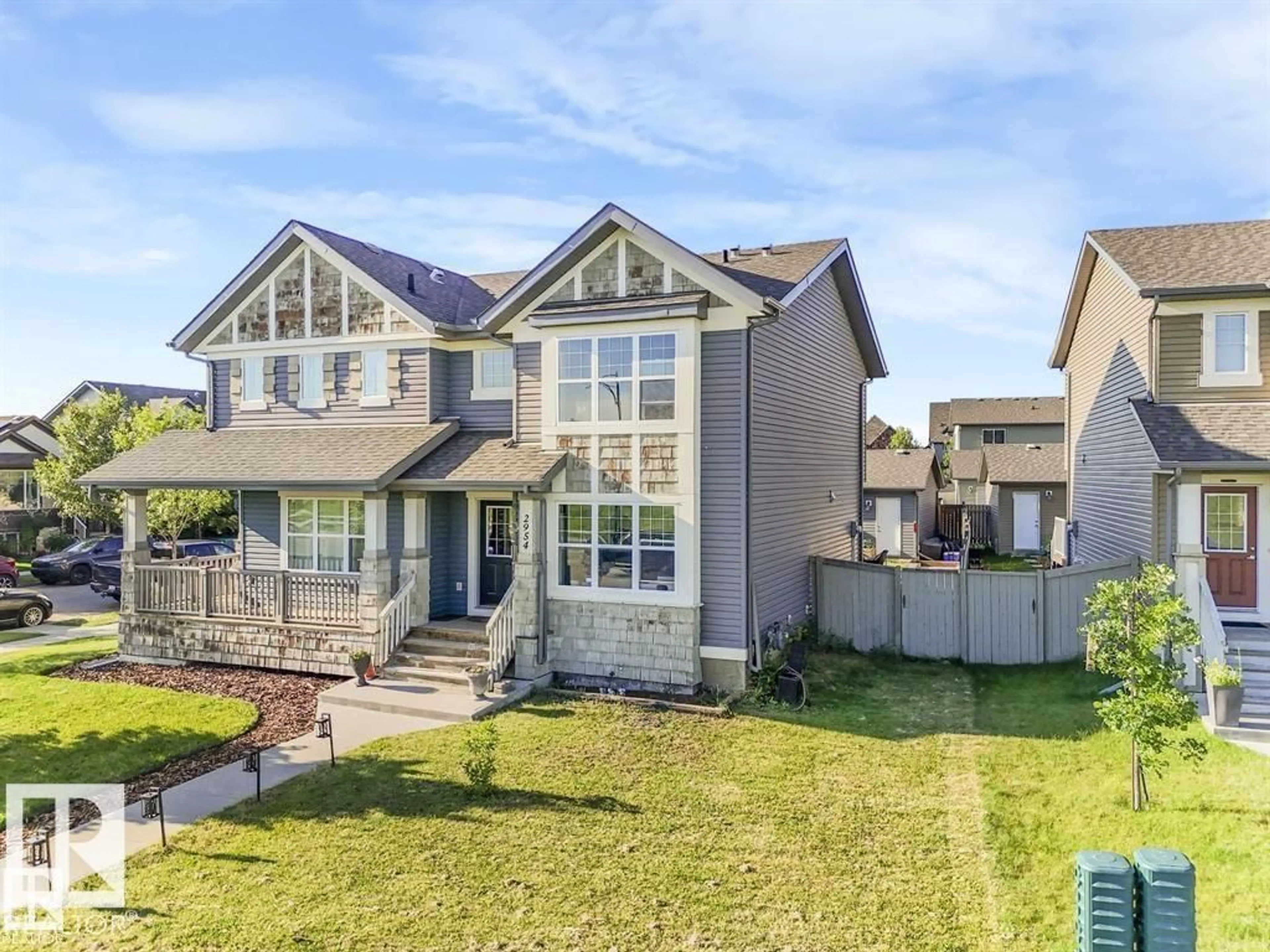 Home with vinyl exterior material, street for 2954 18A AV, Edmonton Alberta T6T0N7